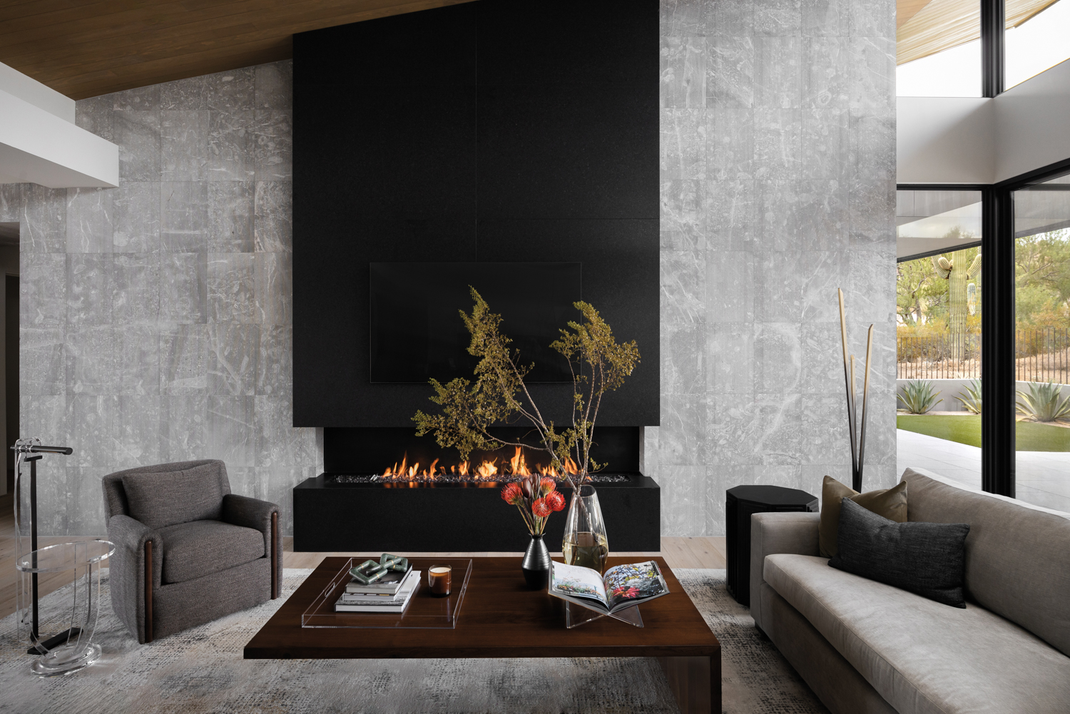 modern grey living room with black fireplace