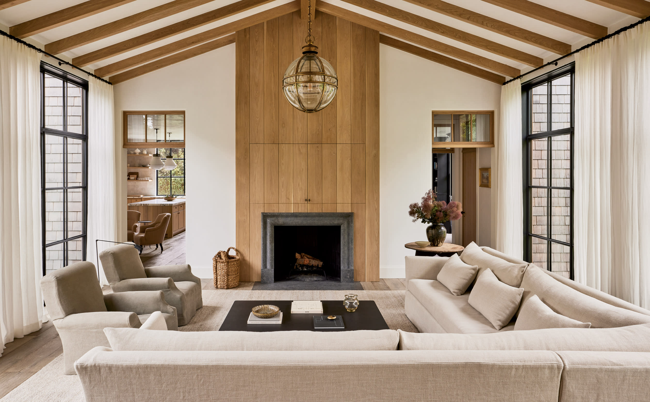 Hamptons home's living room in neutral tones with a relaxing vibe