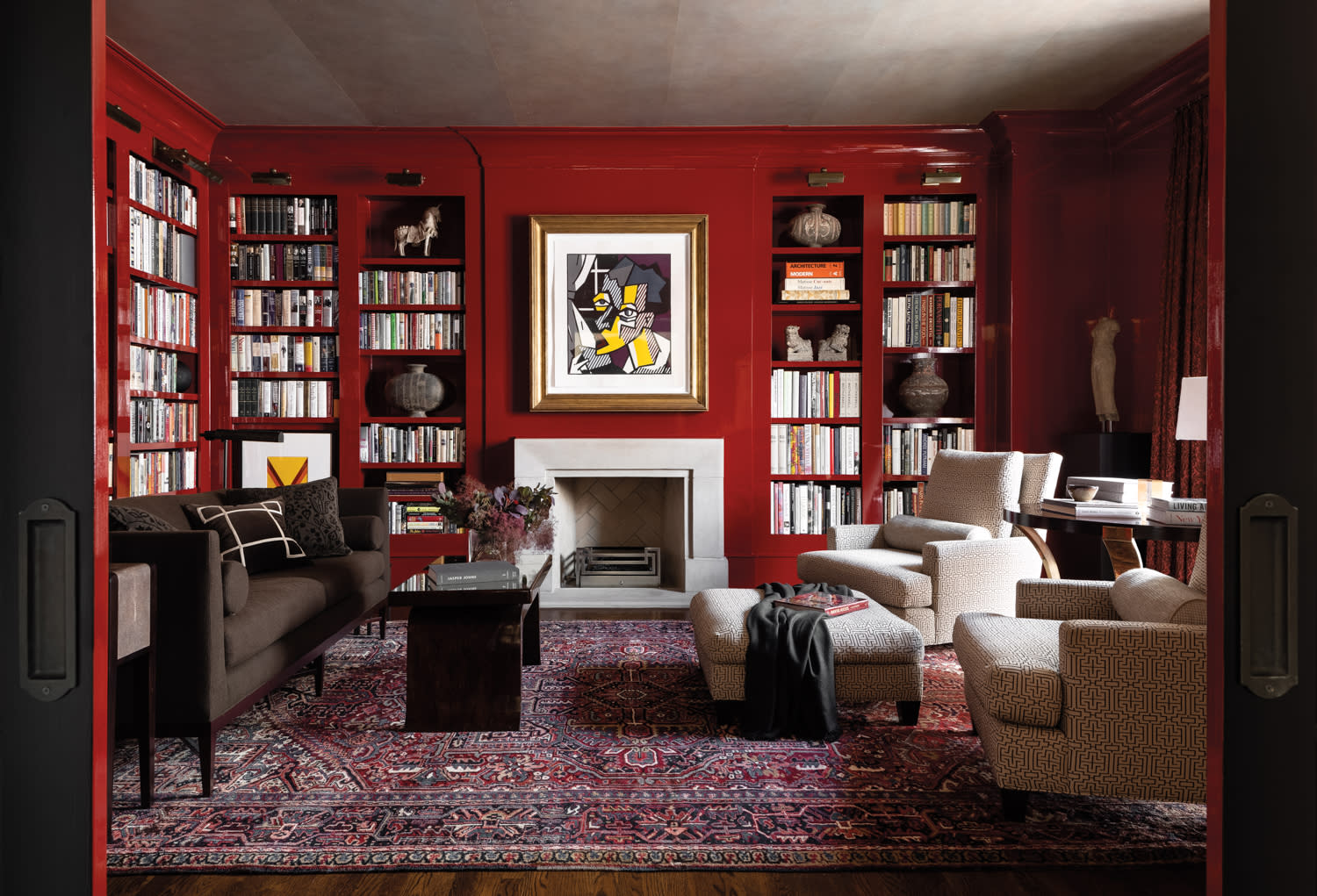 Library with red walls and silver tea paper ceiling