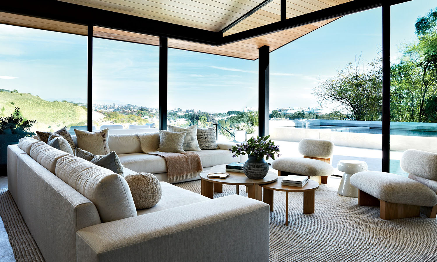 contemporary great room with floor-to-ceiling windows