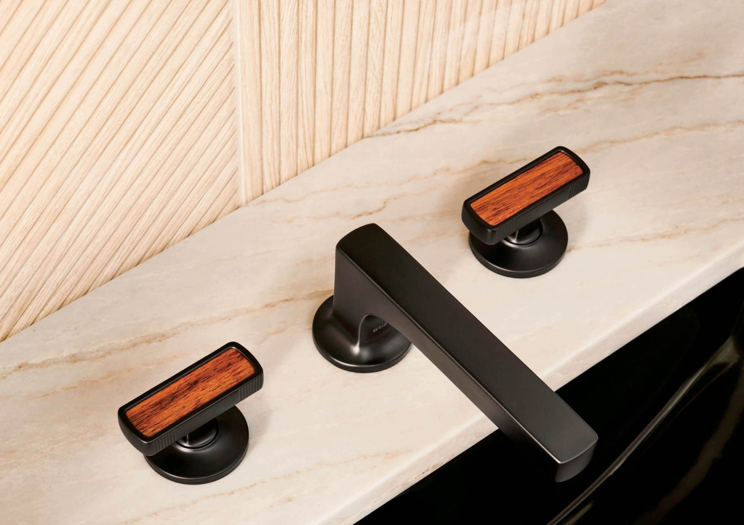 black faucet with wood accents