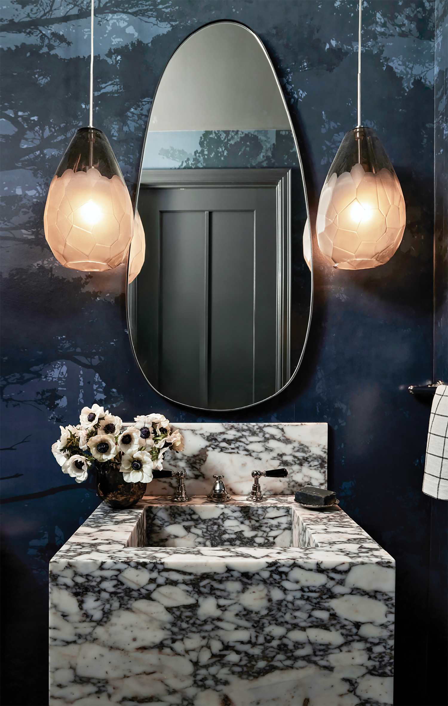 blue powder room with a Calacatta Viola marble sink