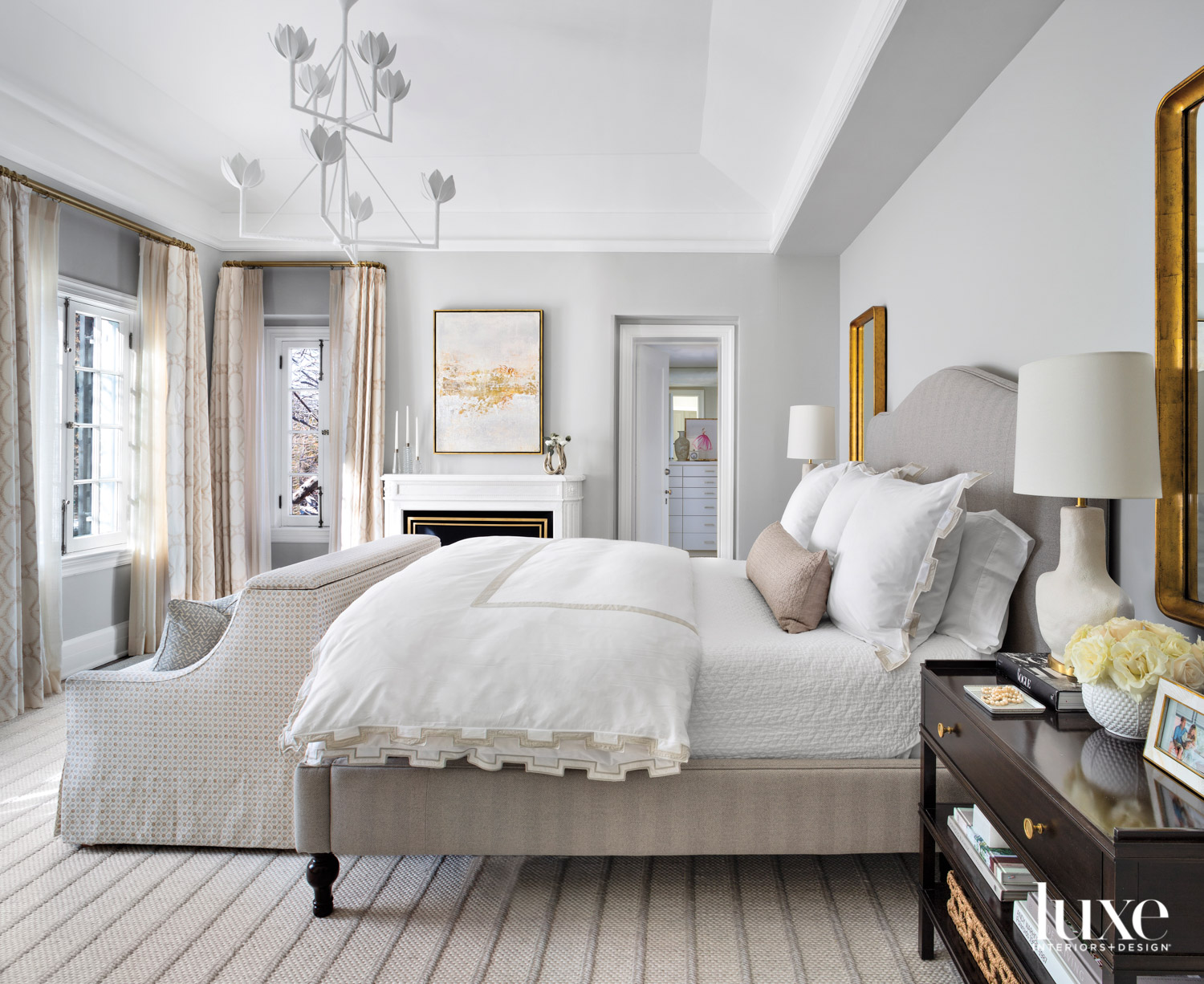 neutral main zen bedroom with white plaster chandelier