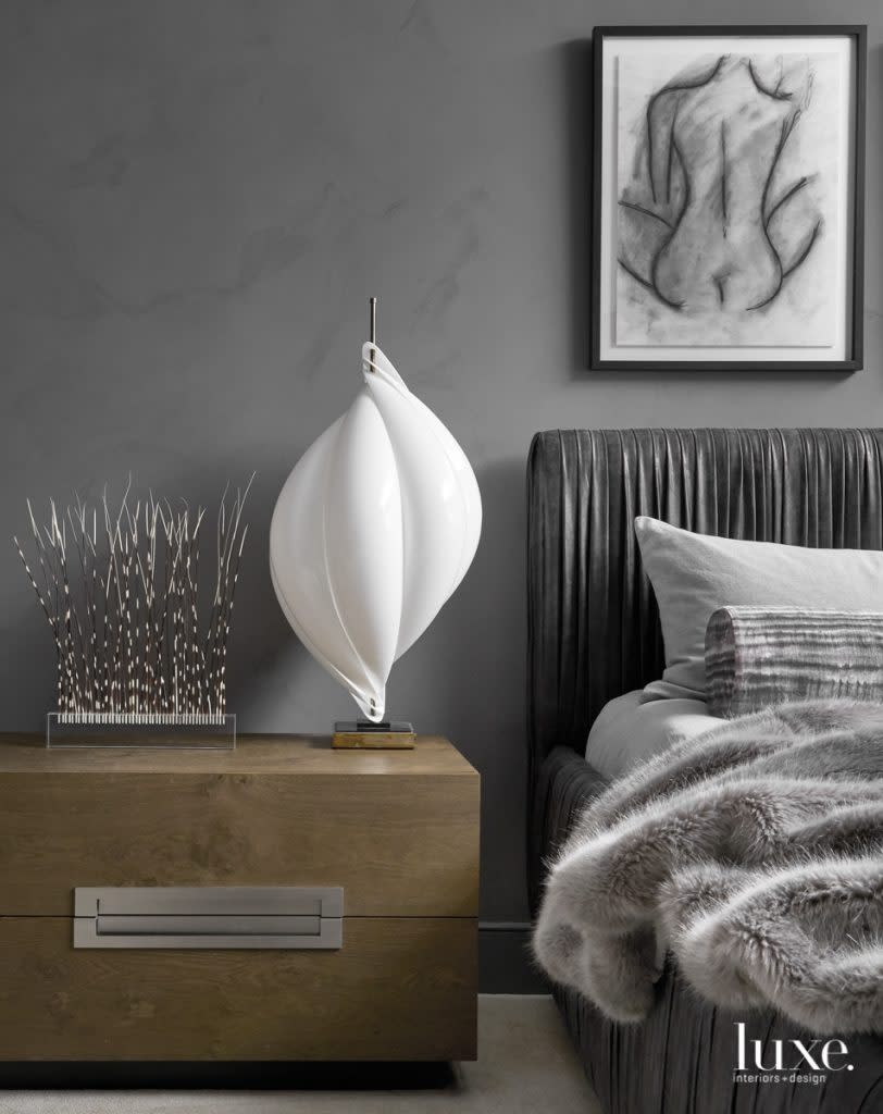 Alex accompanied Svenstrup to South Loop Loft, where, she reports about the discovery of a vintage piece by an unknown artist, "he immediately picked my favorite art in the entire place" for the master bedroom. Atop the RH night table is an acrylic Roger Rougier lamp. The Venetian plaster walls are by Luis Venegas Plastering.