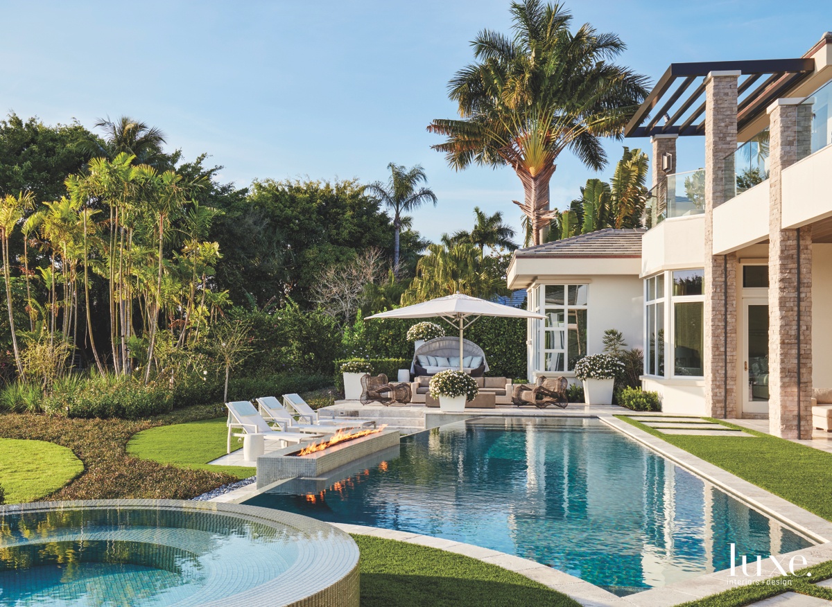 contemporary outdoor pool area fire pit landscape boca raton retreat