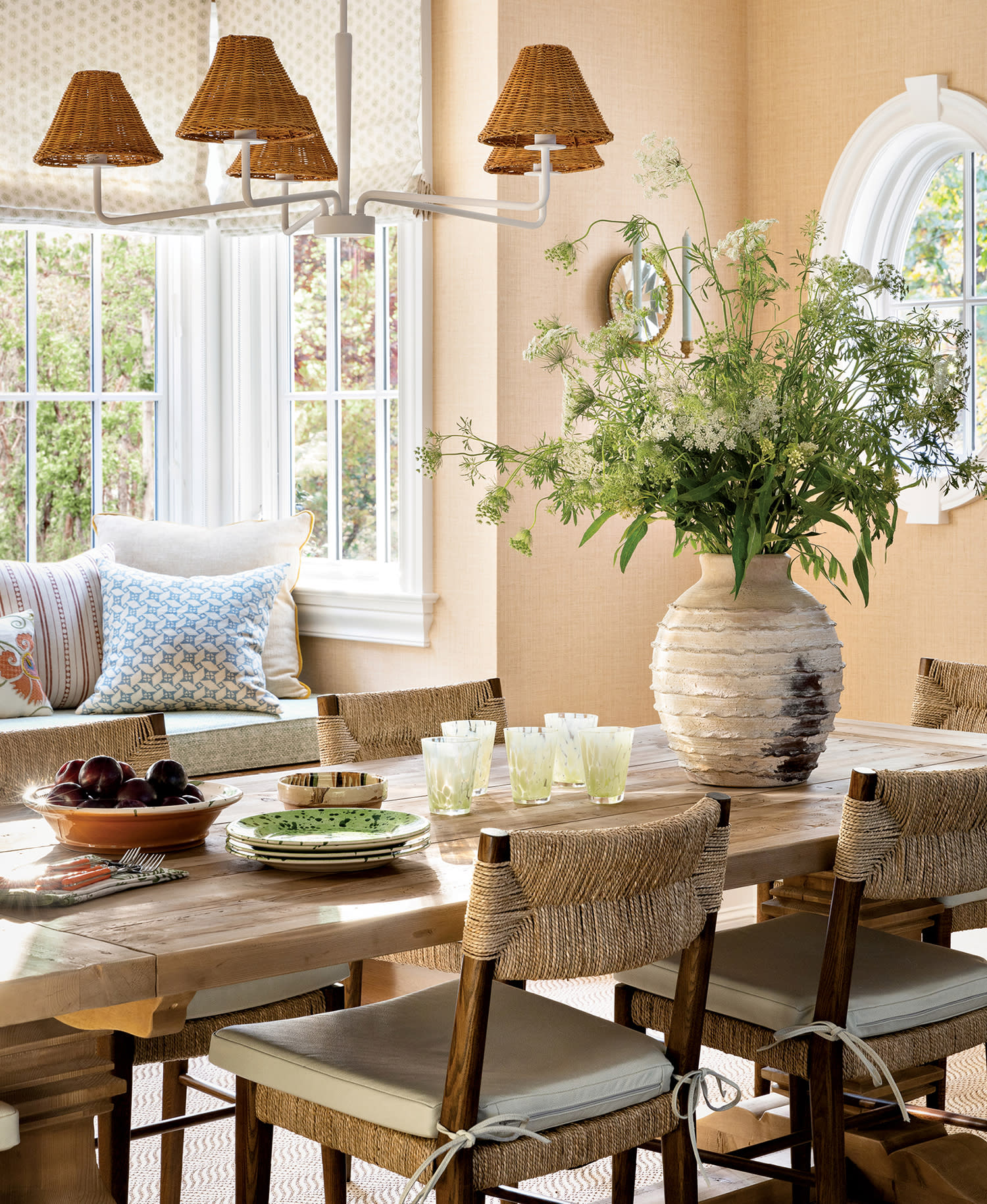 charming breakfast nook with light pink/orange walls