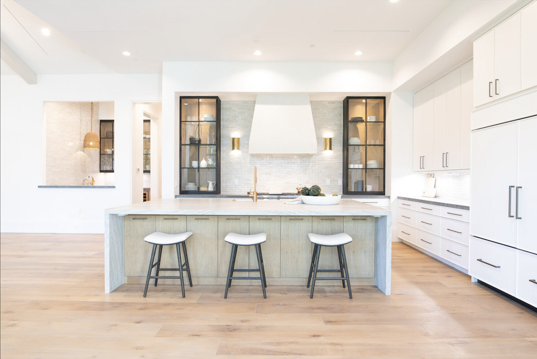 home builder white kitchen in Houston, texas with big island