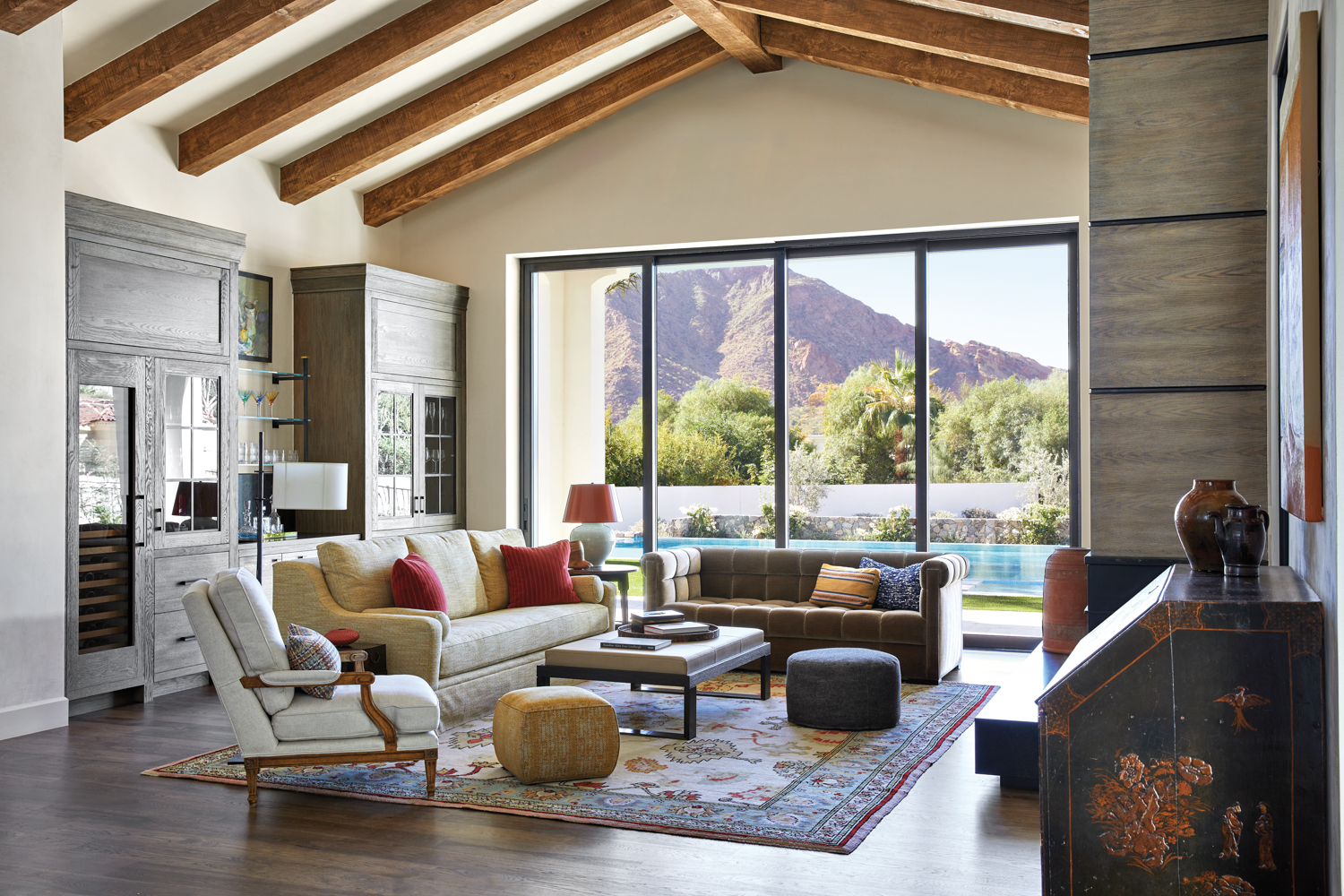 Santa Barbara style living room with views of Camelback Mountain through the windows