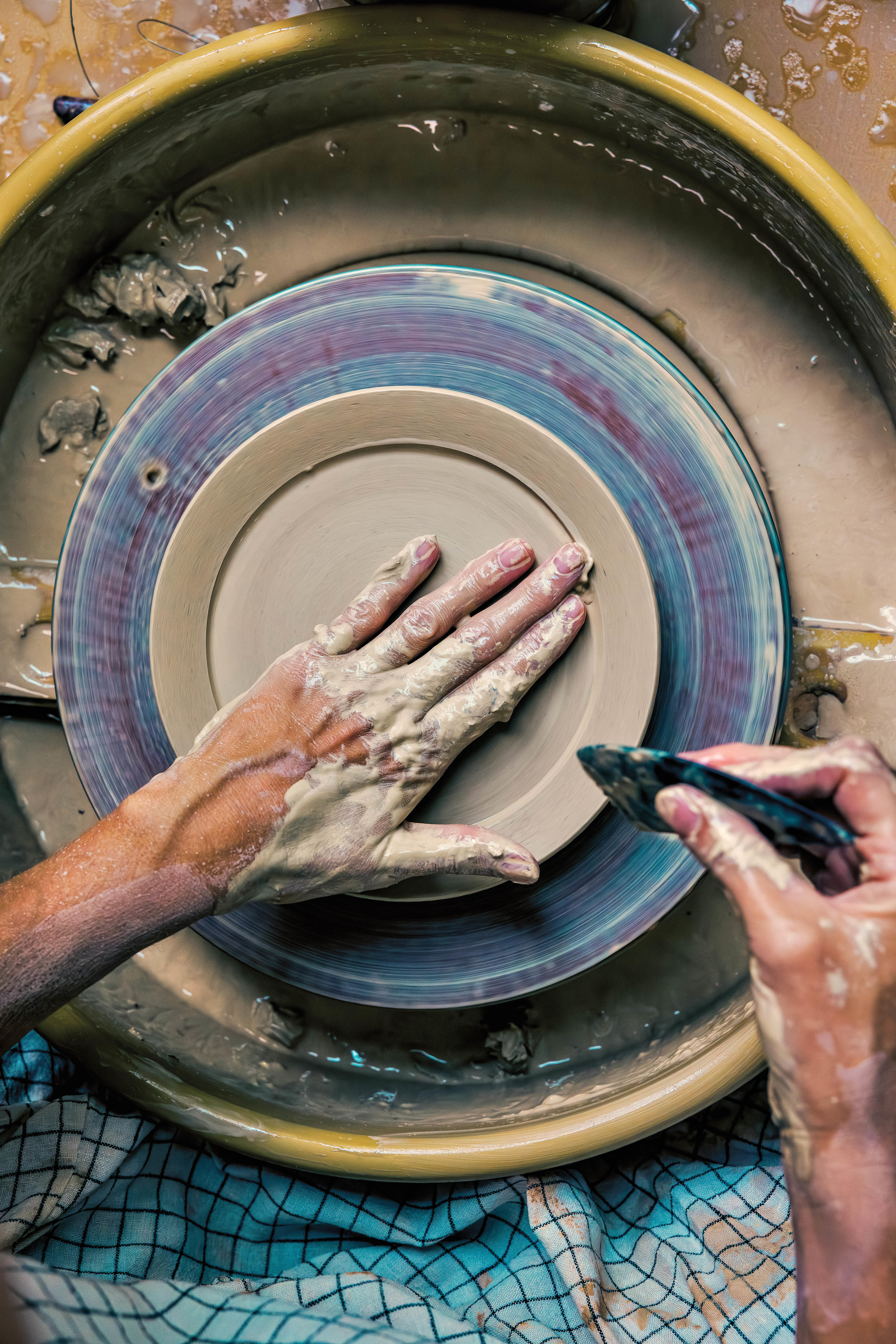 potter working at a wheel