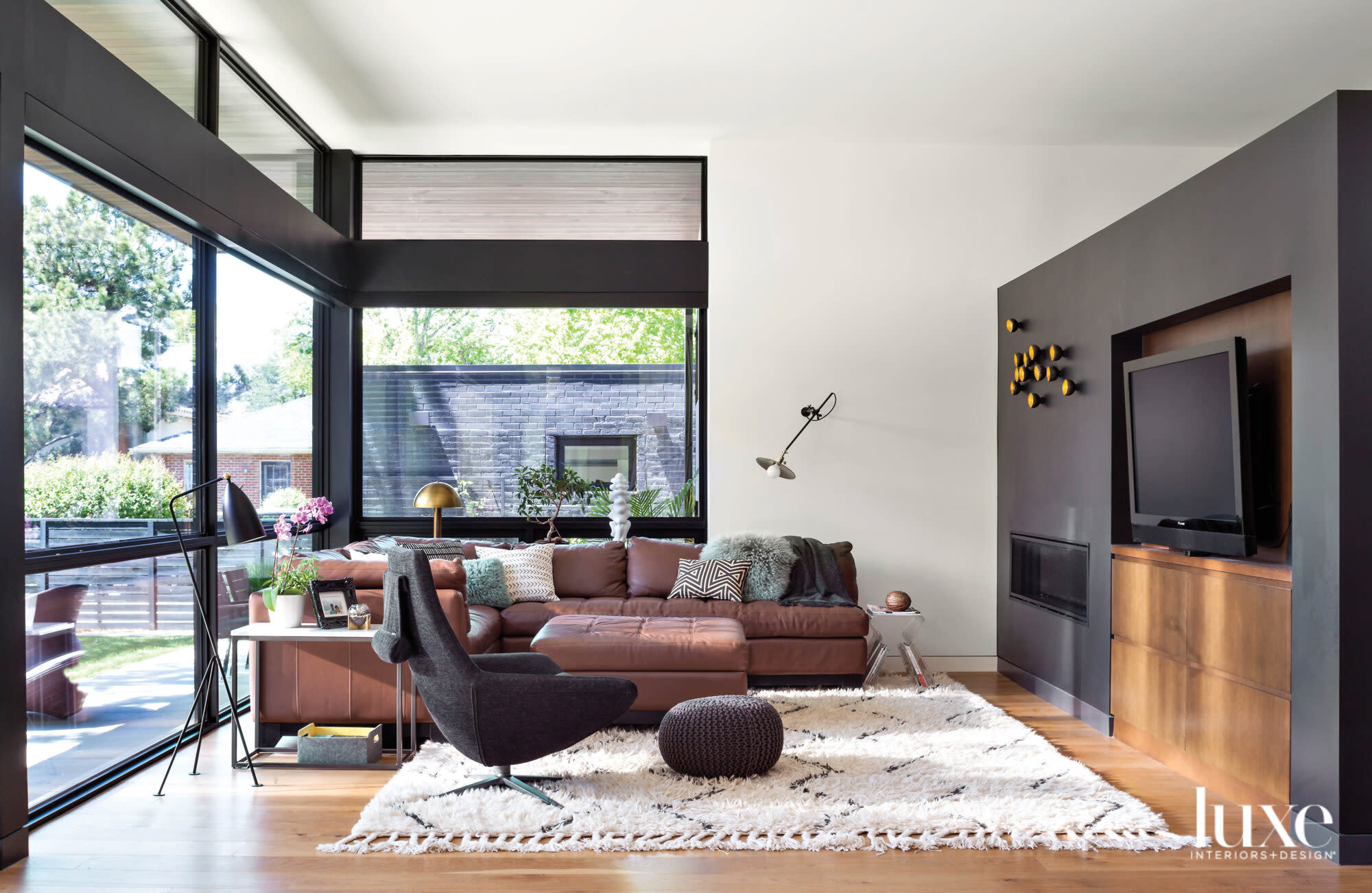 living room with floor to ceiling windows