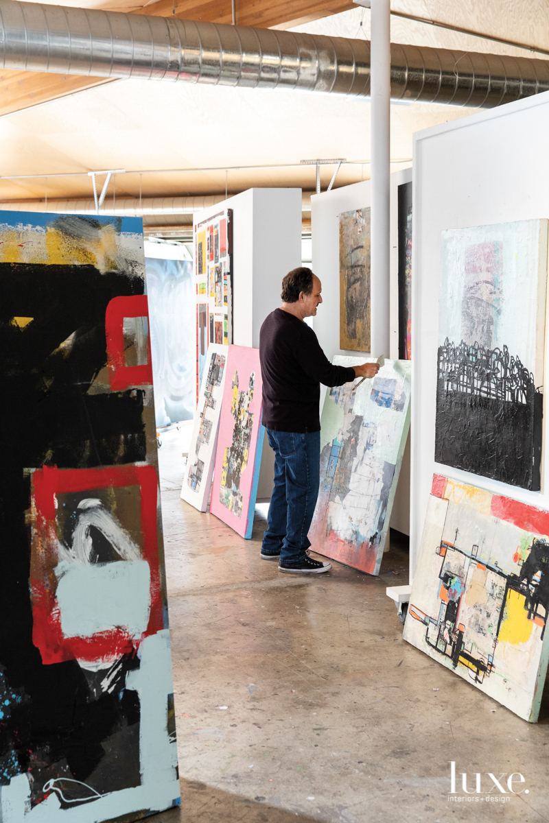 Viglietta painting in his studio.