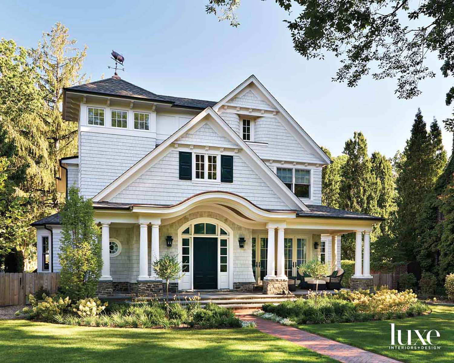 transitional gray shingle-style house exterior