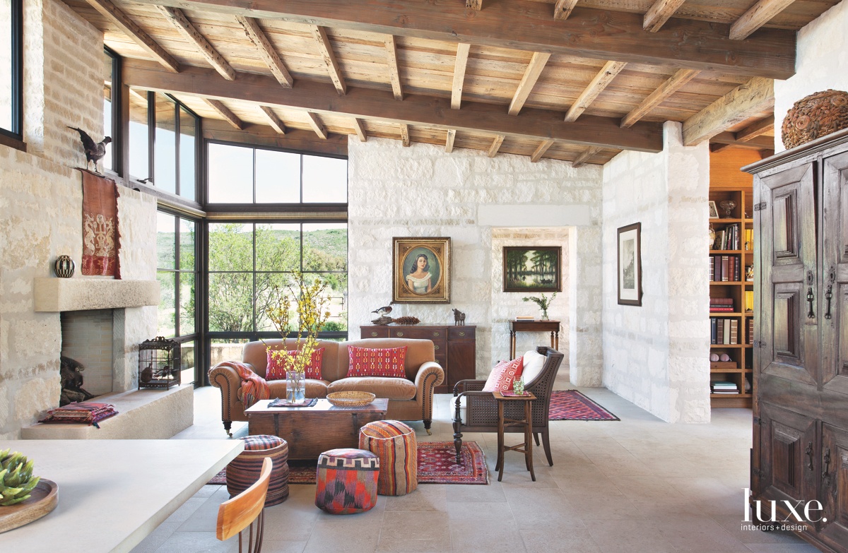 contemporary living room velvet couch red accents coffee table