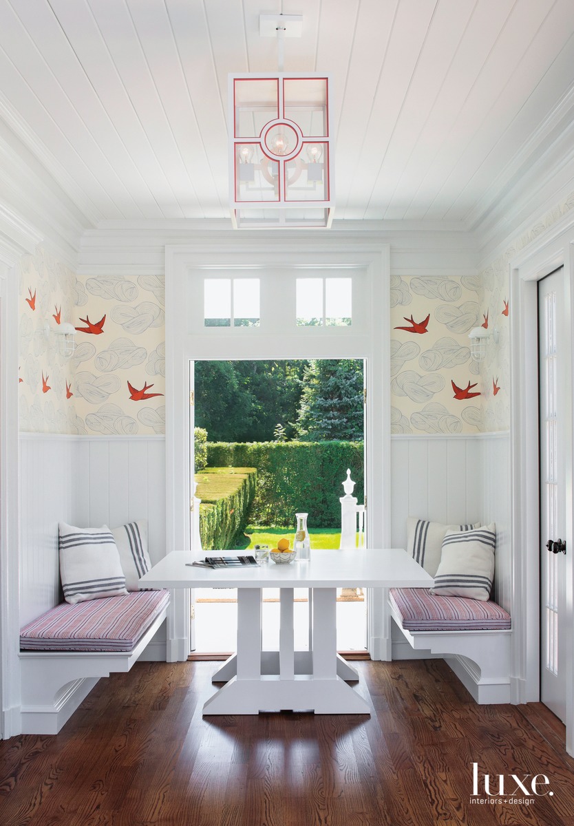 traditional sunroom sitting area white