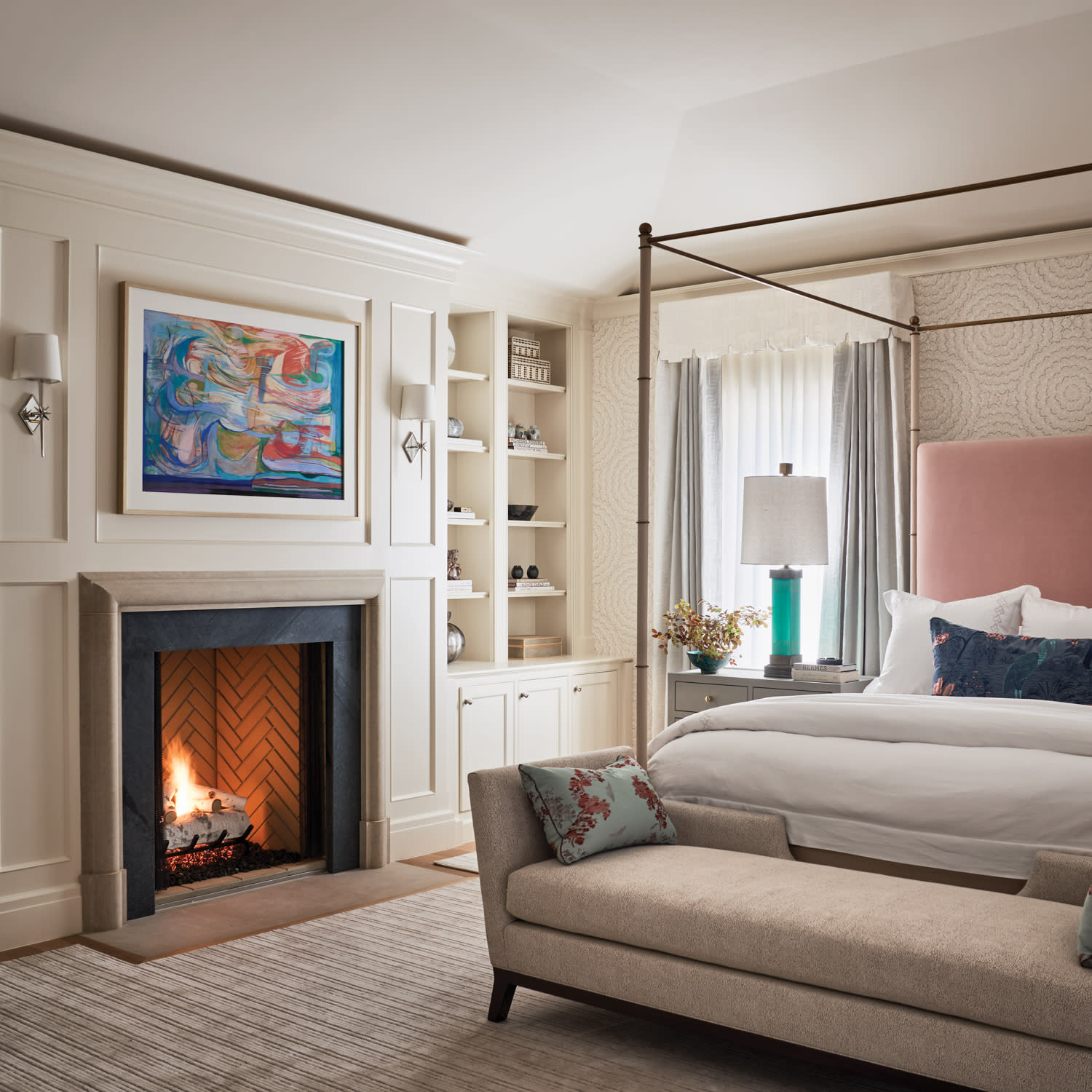 traditional bedroom with a four poster bed and a pink headboard