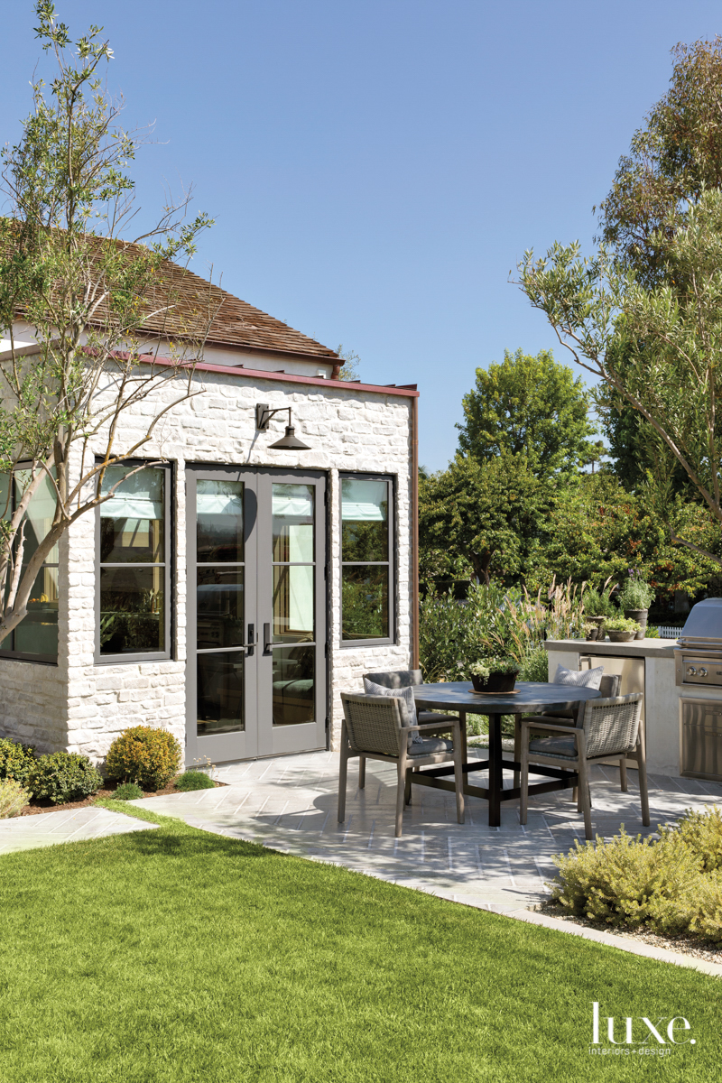 outdoor sitting area with a grill