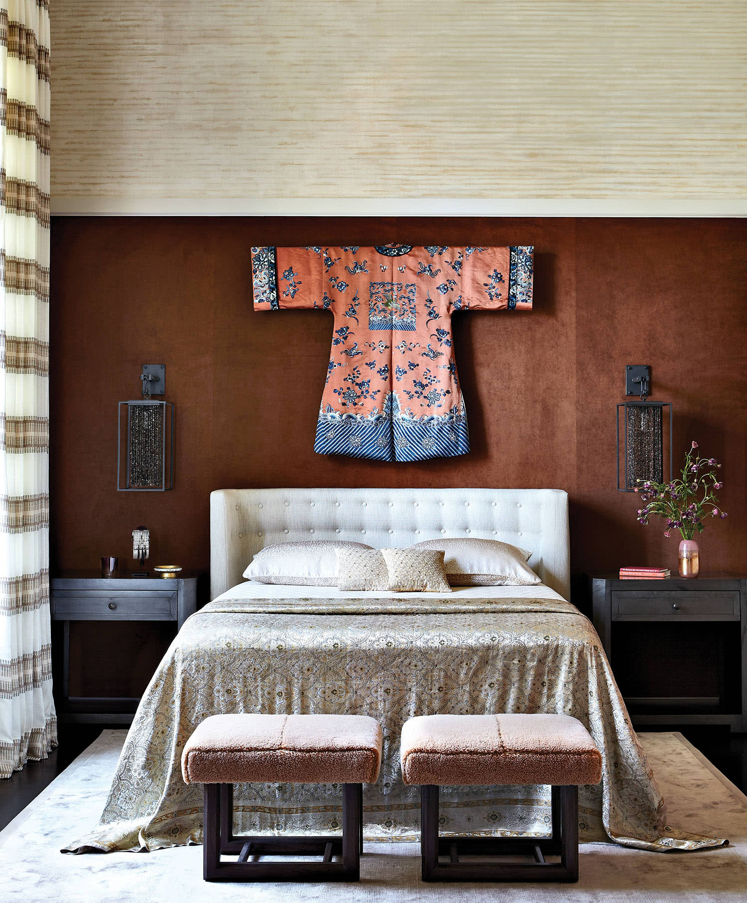 bedroom with a kimono above the bed