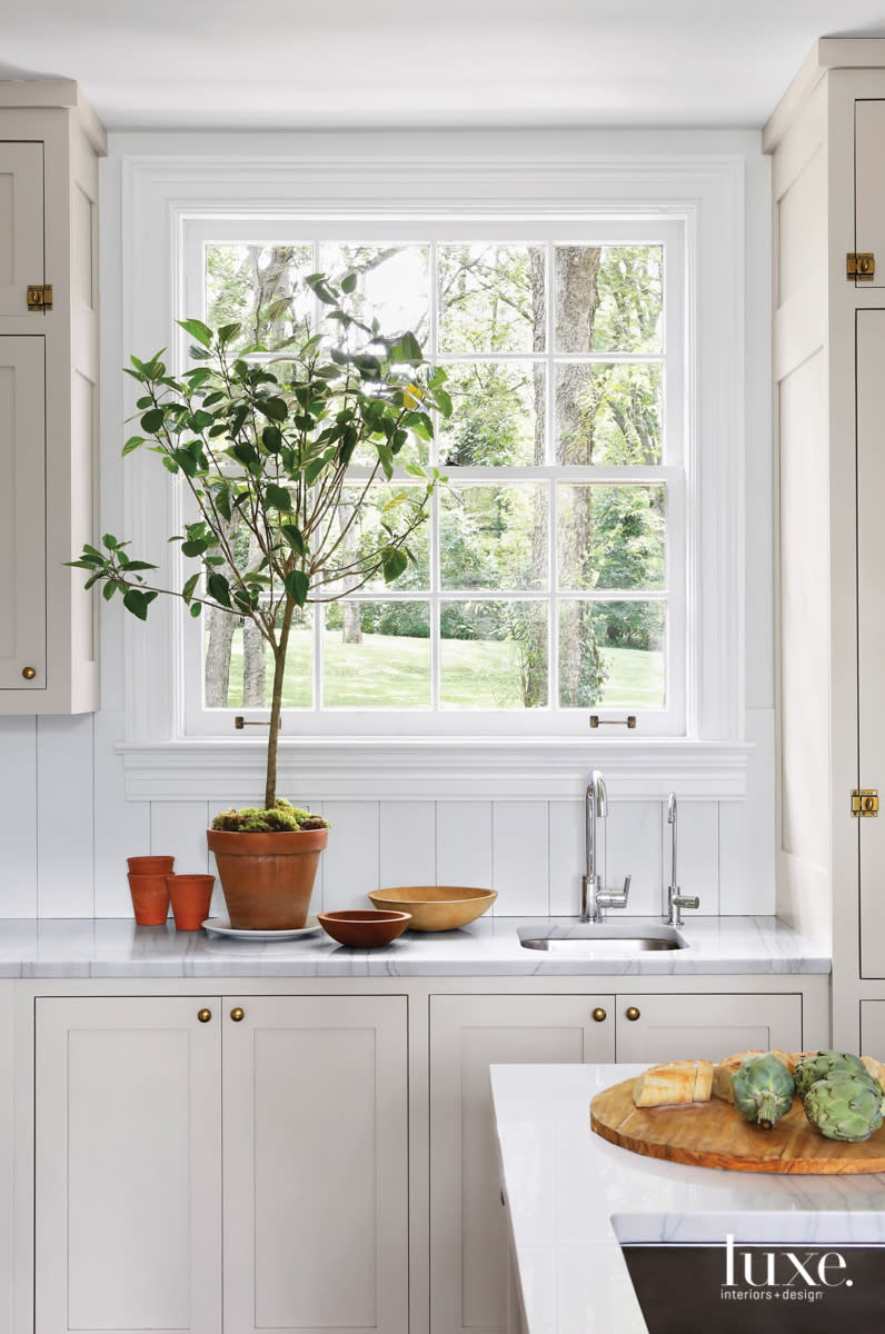 kitchen prep sink with quartzite countertops