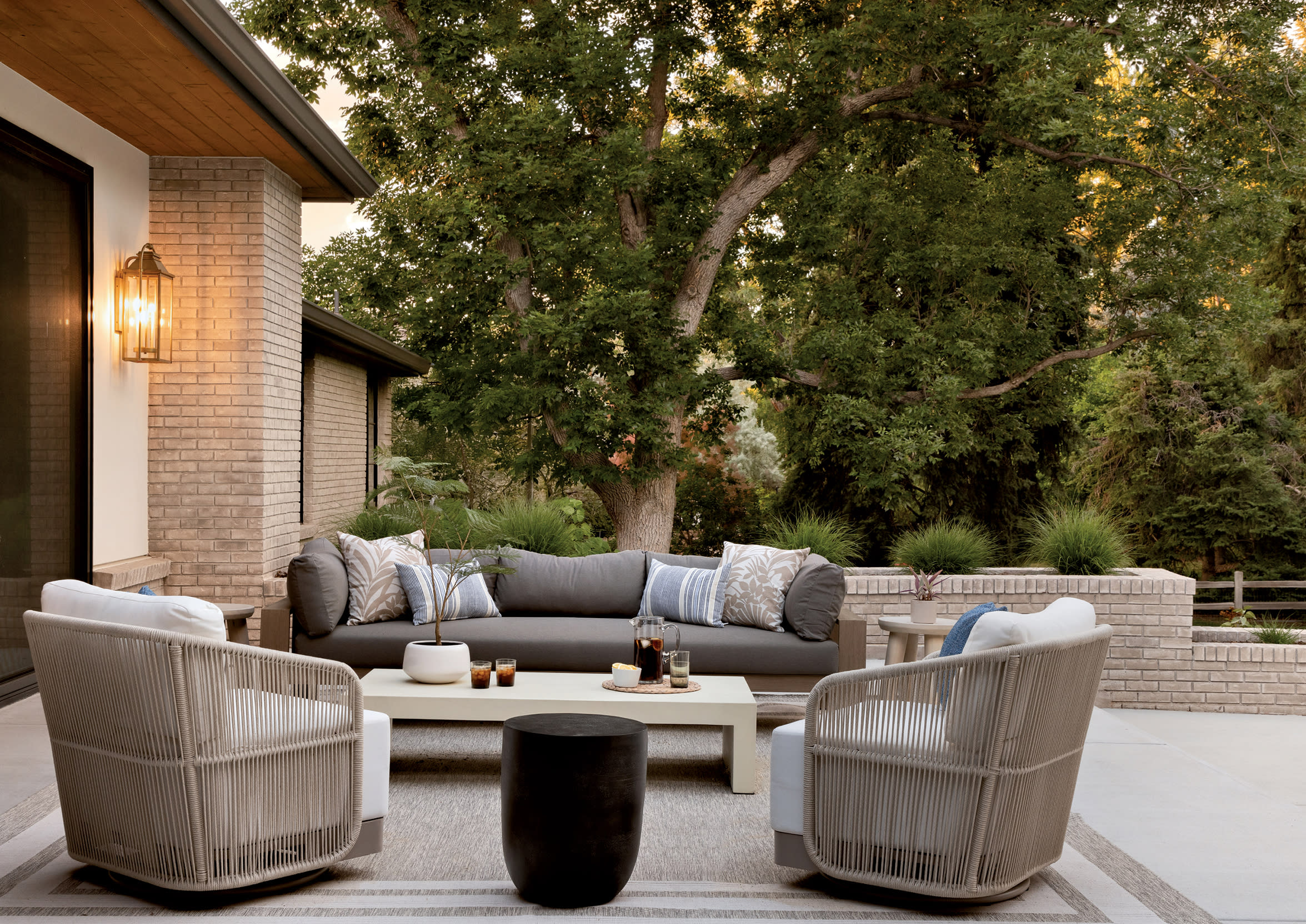 outdoor living area off a classic home's brick exterior