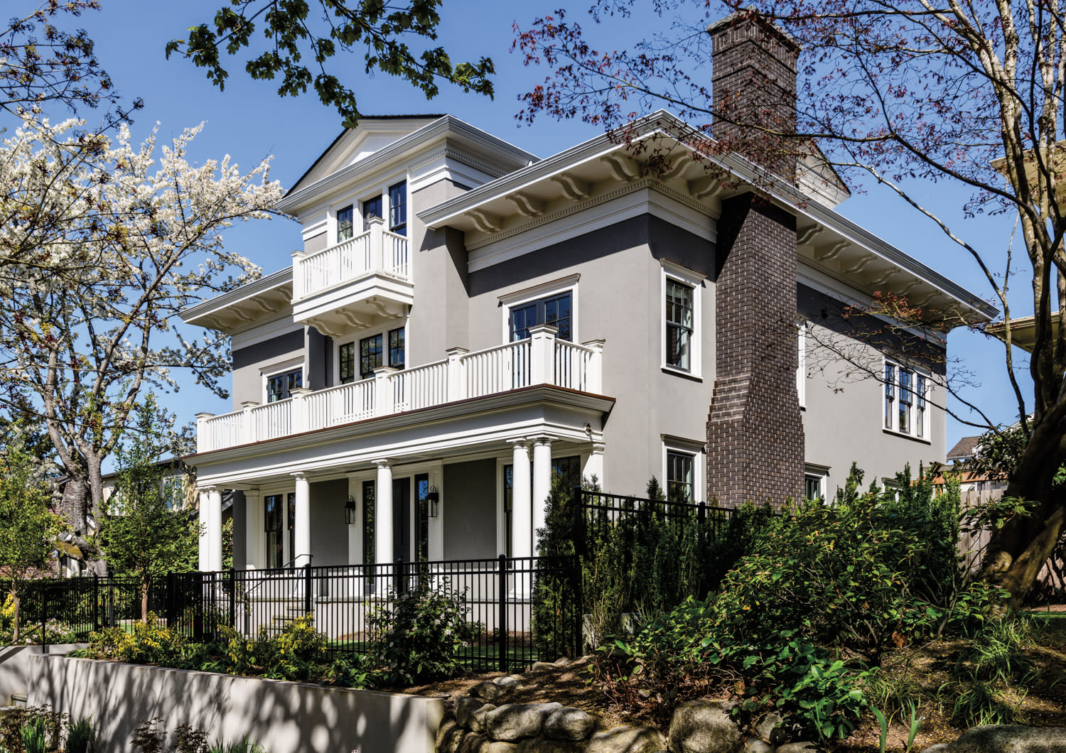 Seattle home by James Romano with classic exterior and facade made of stucco