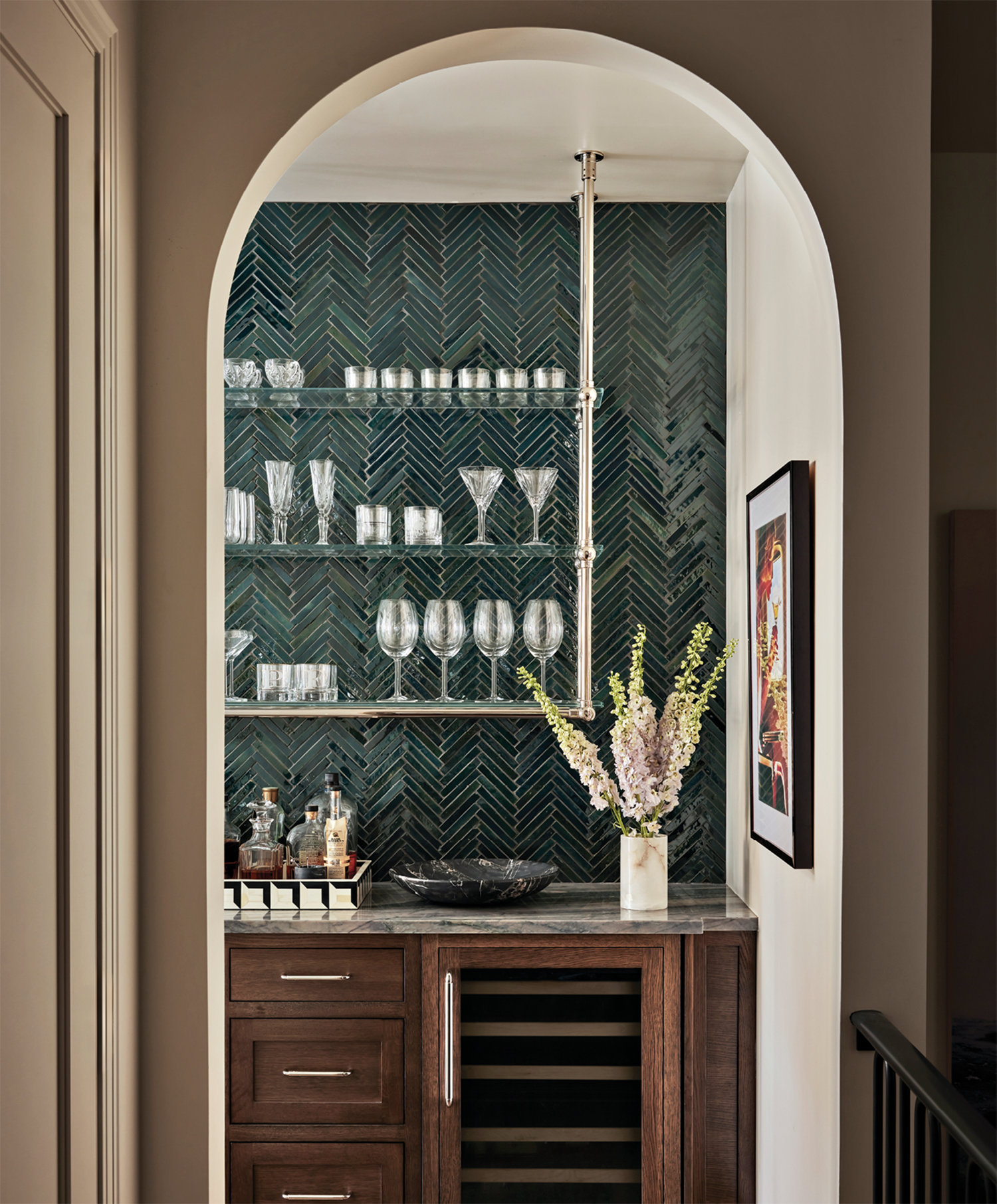 home bar with herringbone blue-green tile backsplash