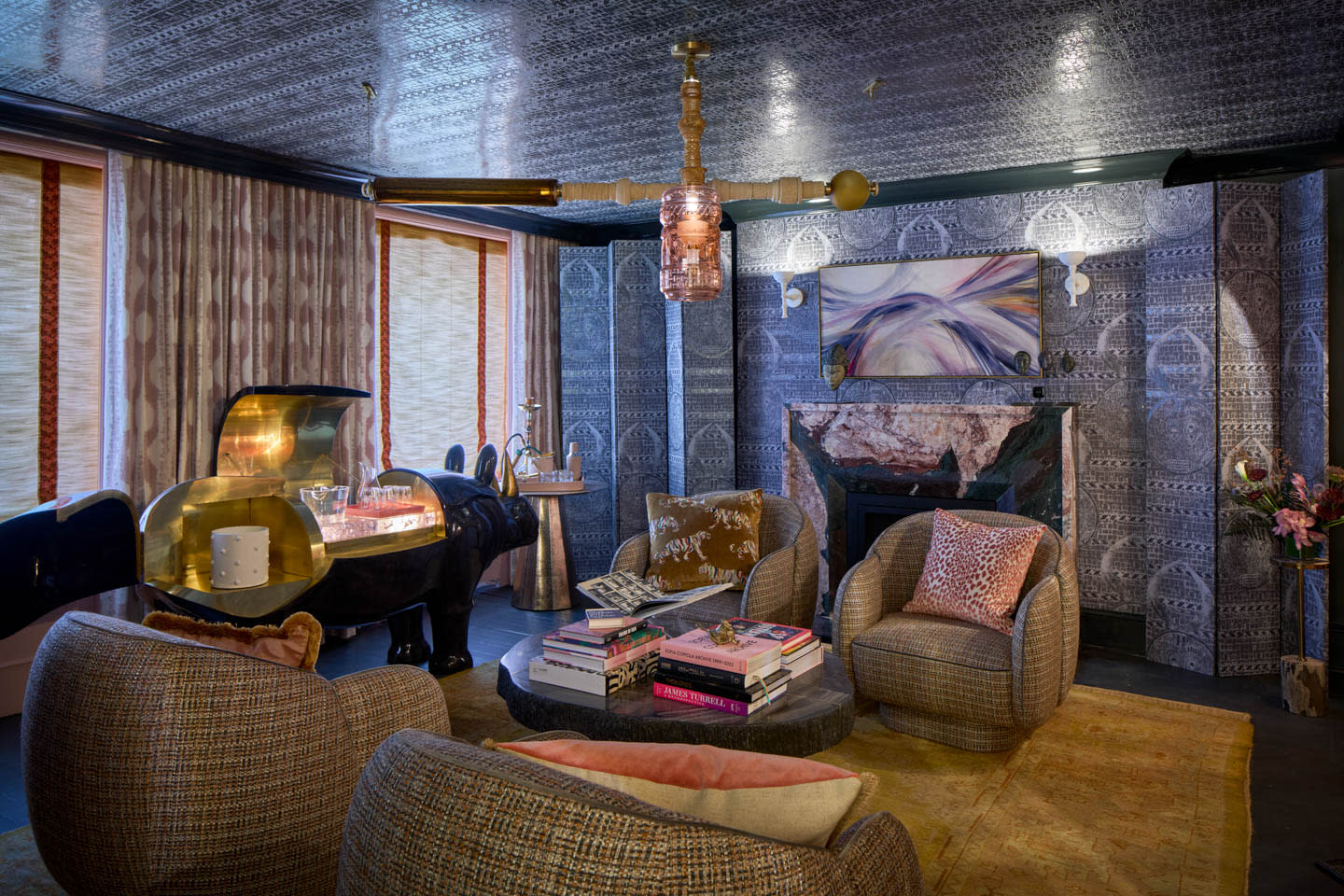 purple and pink lounge at Kips Bay New York featuring a rhinoceros-shaped dry bar