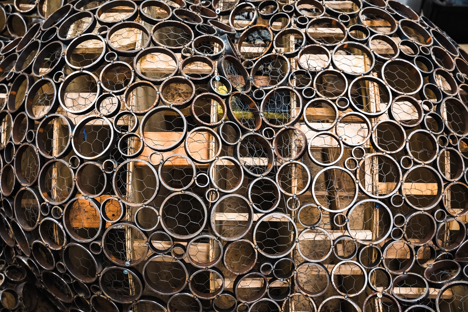 sculpture made of interlocking steel rings