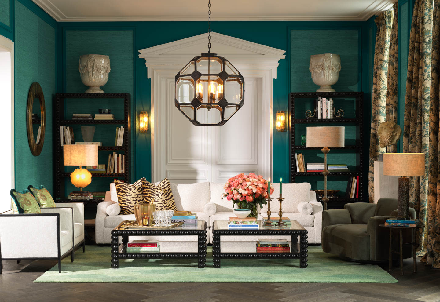 green living room vignette topped by a pendant light from the Eichholtz x Corey Damen Jenkins collab