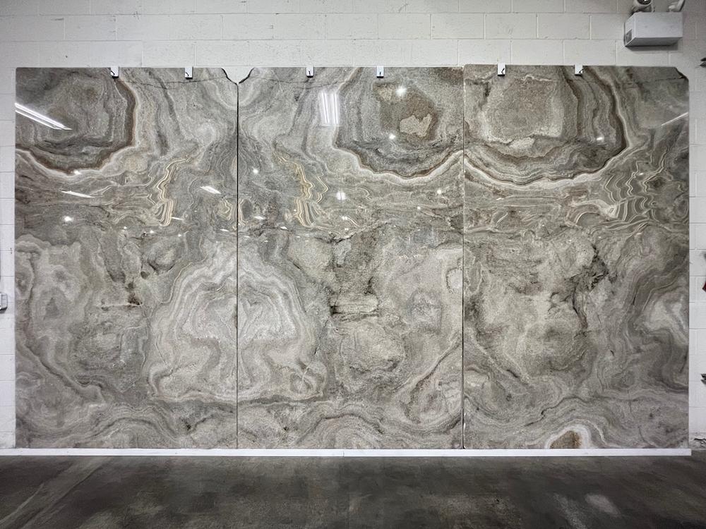 Slabs of natural stone such as granite, marble, quartzite, and onyx at Elements Room
