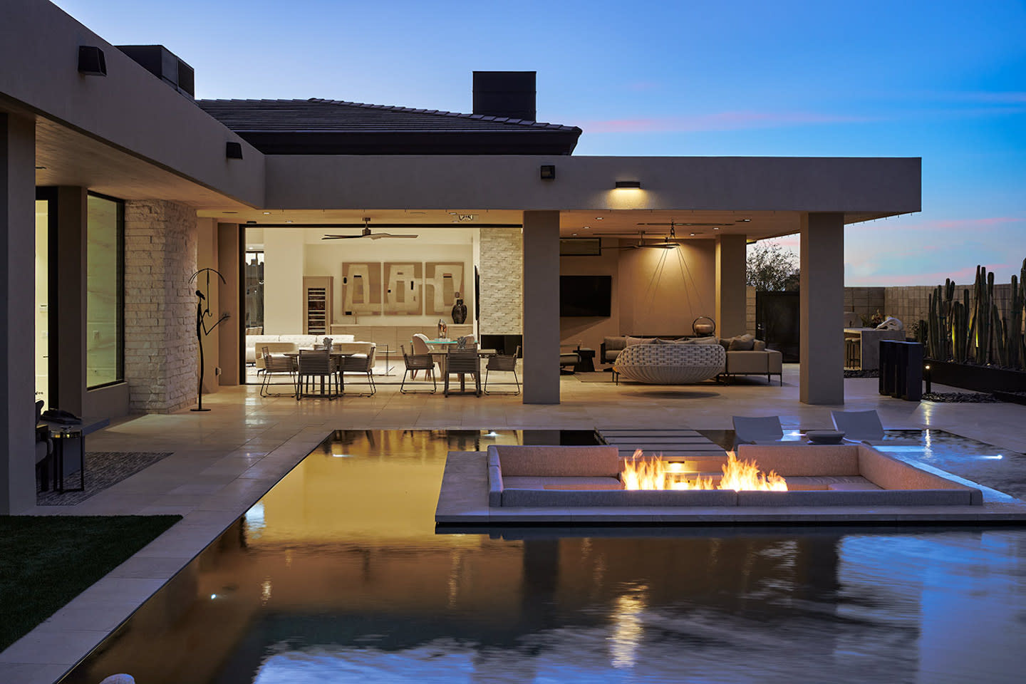 Twilight patio with pool, sunken fire-pit seating