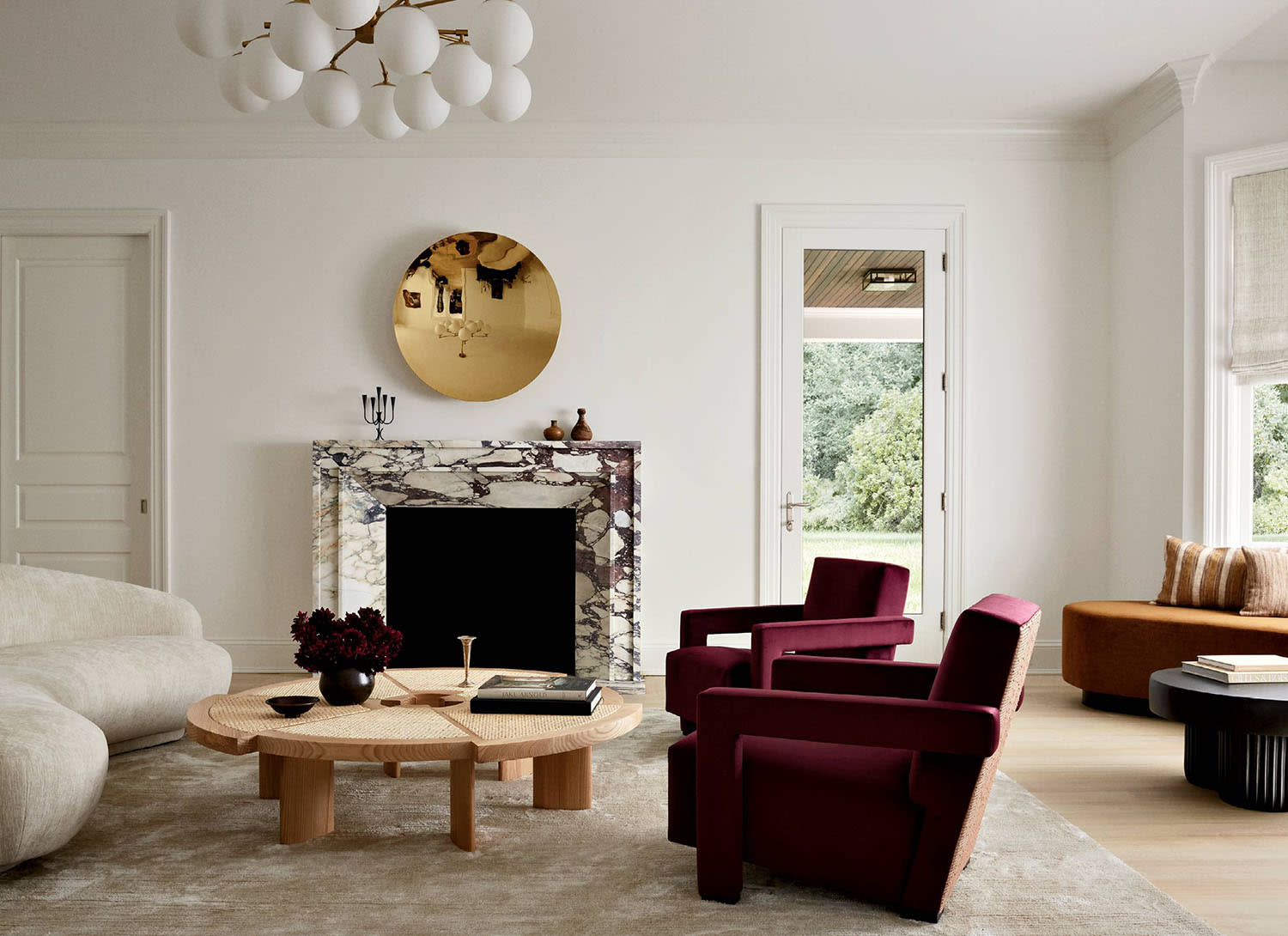 living room with a Calacatta Viola mantel around the fireplace