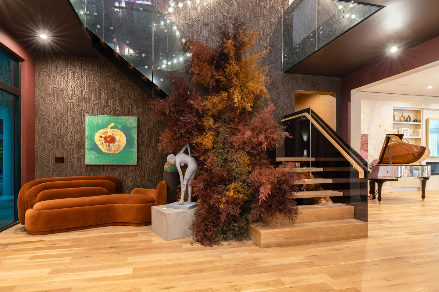 grand foyer with a leaf installation around the stairwell