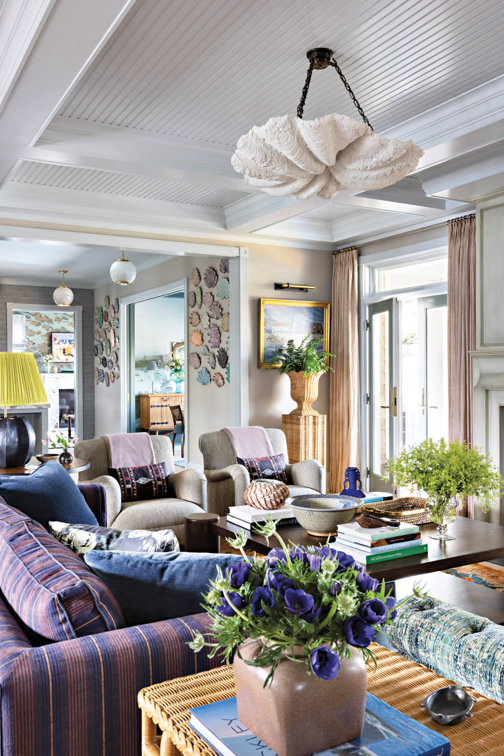 colorful family room with a striped sofa