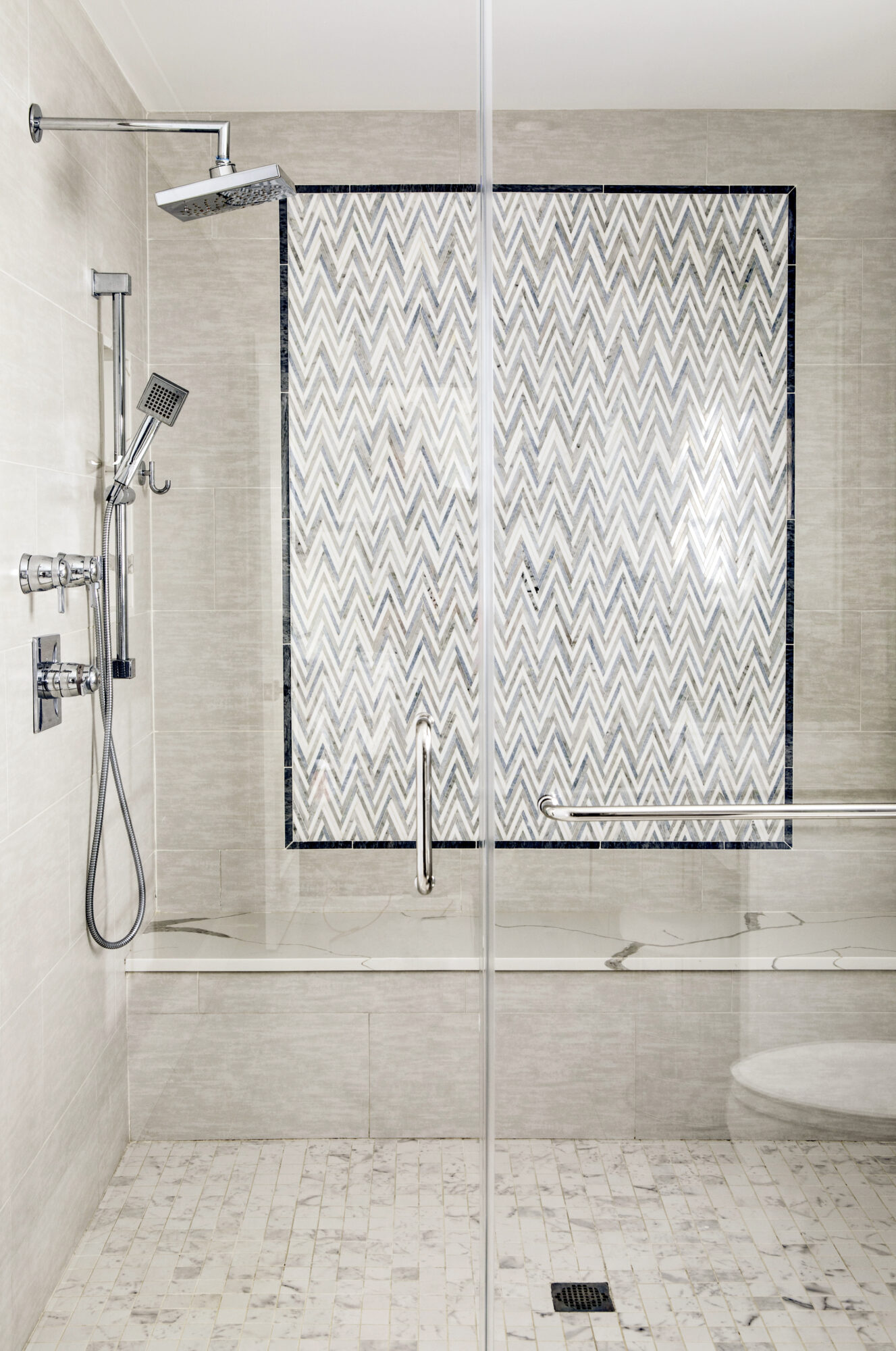 shower feature wall with chevron tile pattern