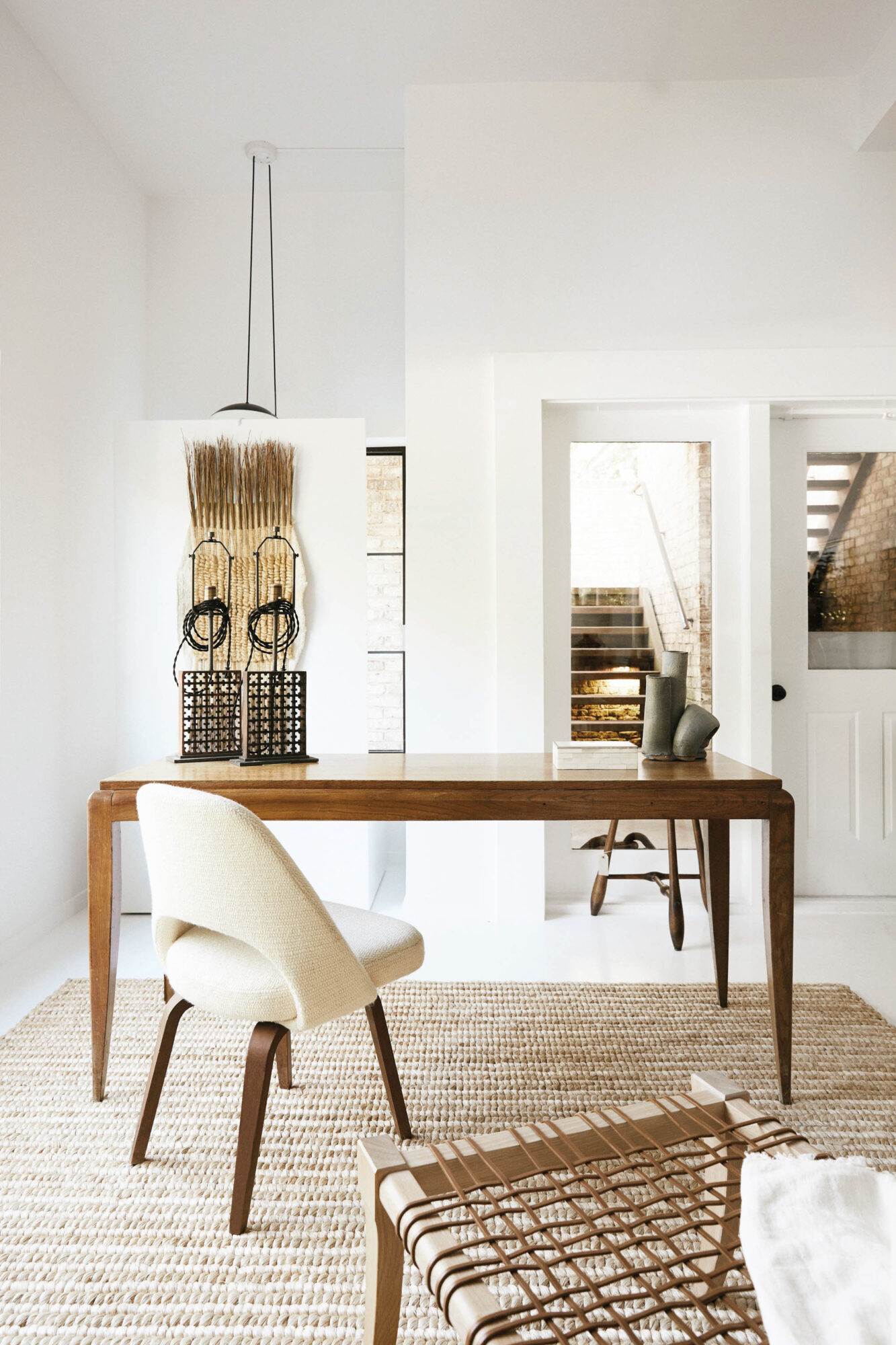 A wooden desk in a bright space