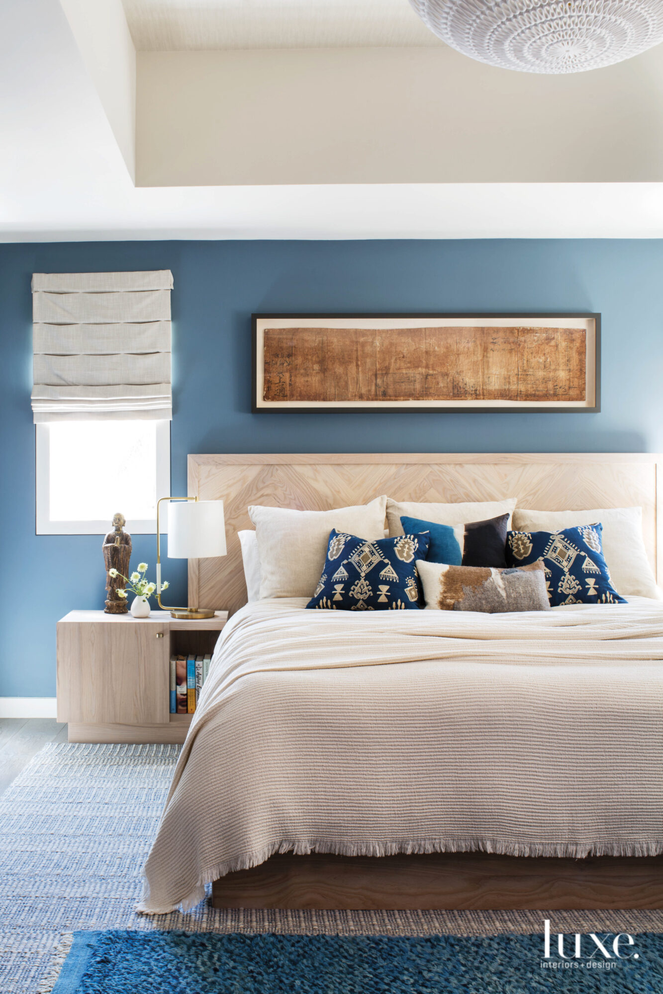 Second master bedroom with blue painted walls