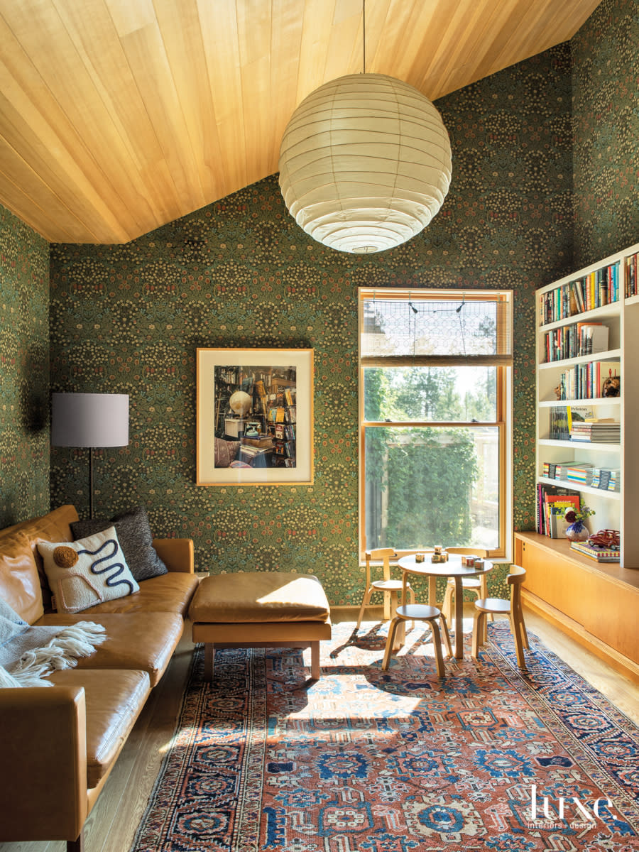 Den with William Morris wallpaper and leather sectional