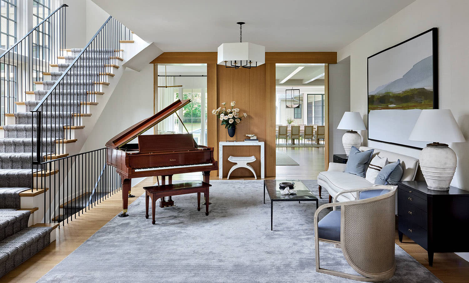 traditional foyer with a baby grand piano 