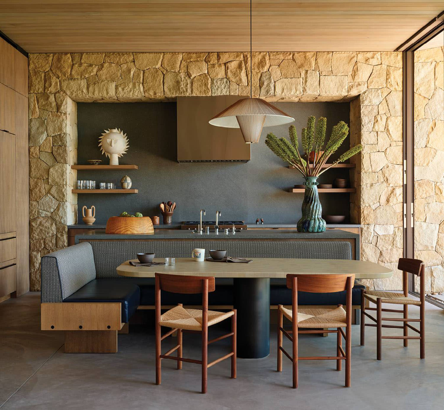 kitchen with stone accents and natural wood finishes
