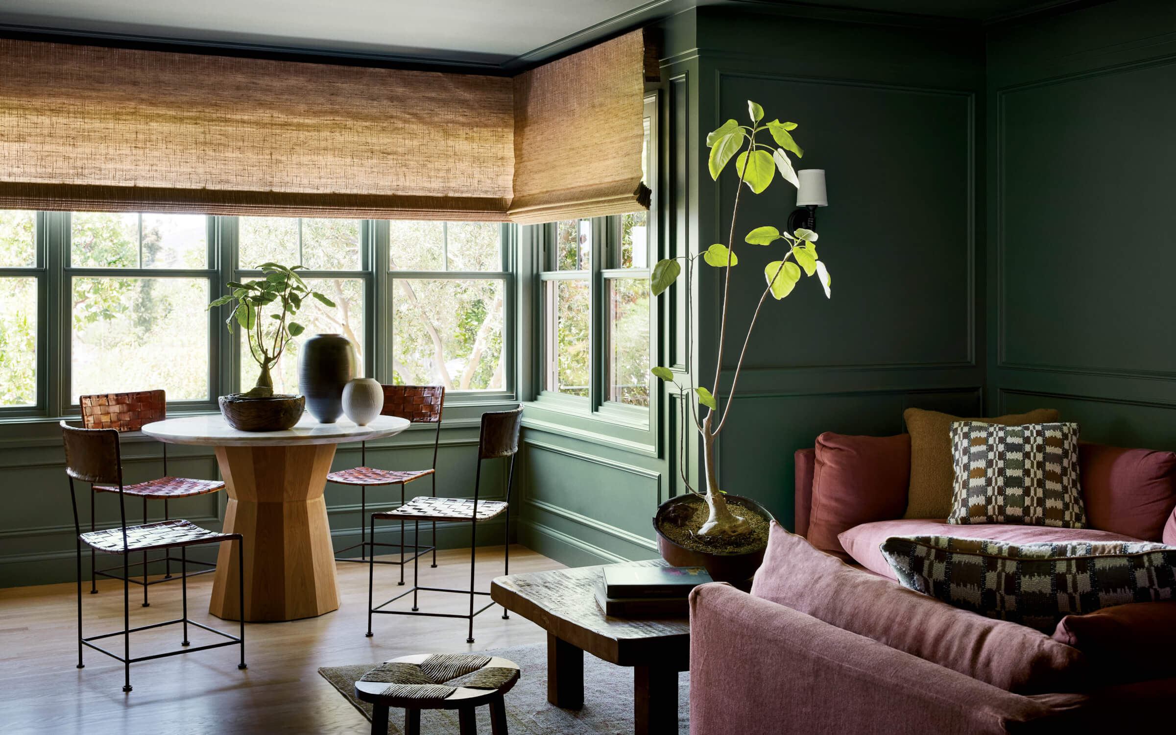 green family room painted in farrow & ball green smoke with dining area