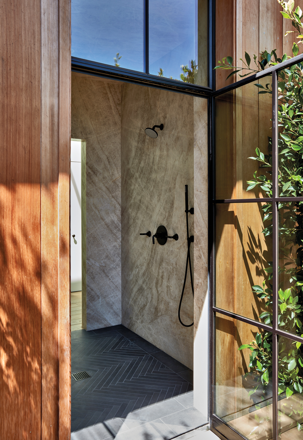 indoor-outdoor walk-in spa shower