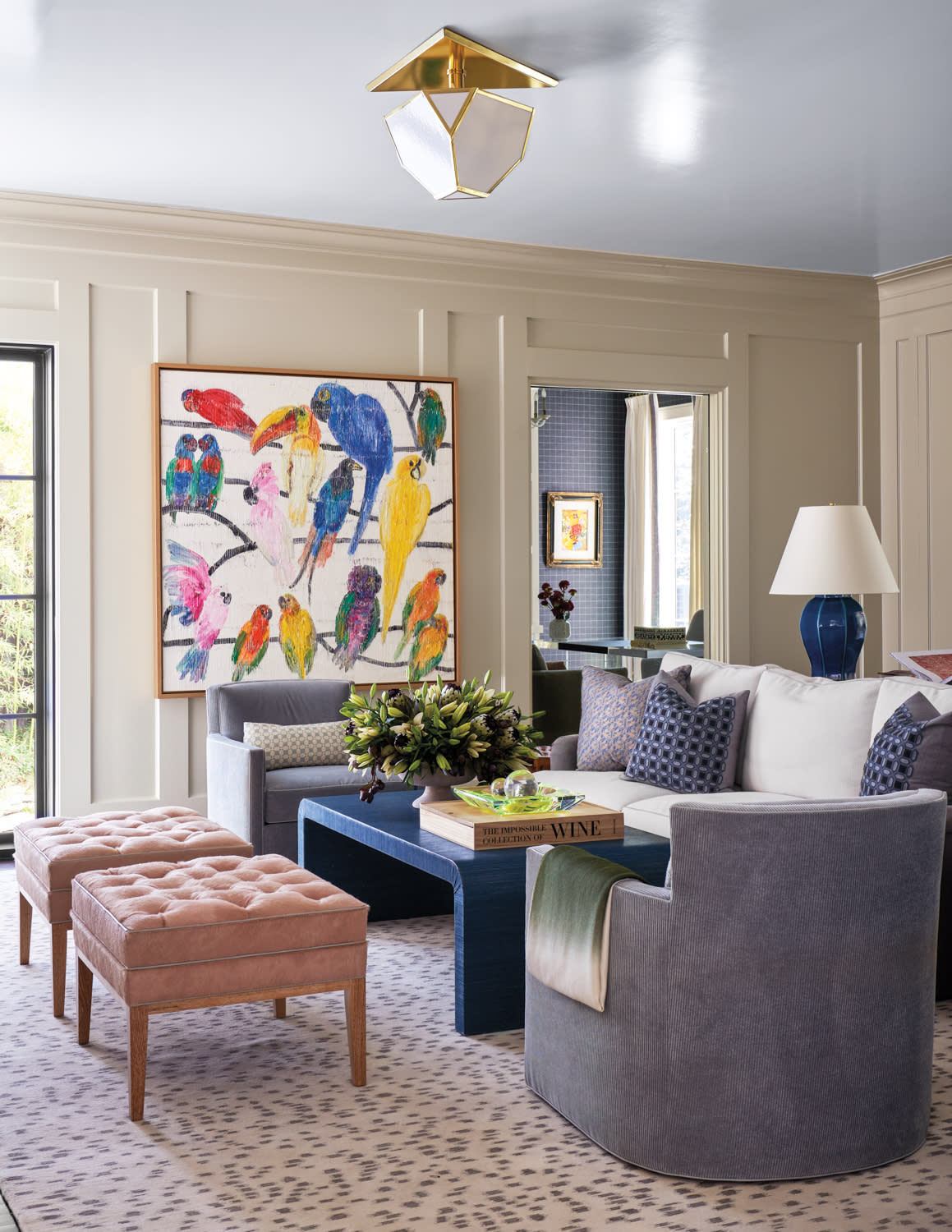 family room with vibrant art and colorful furnishings