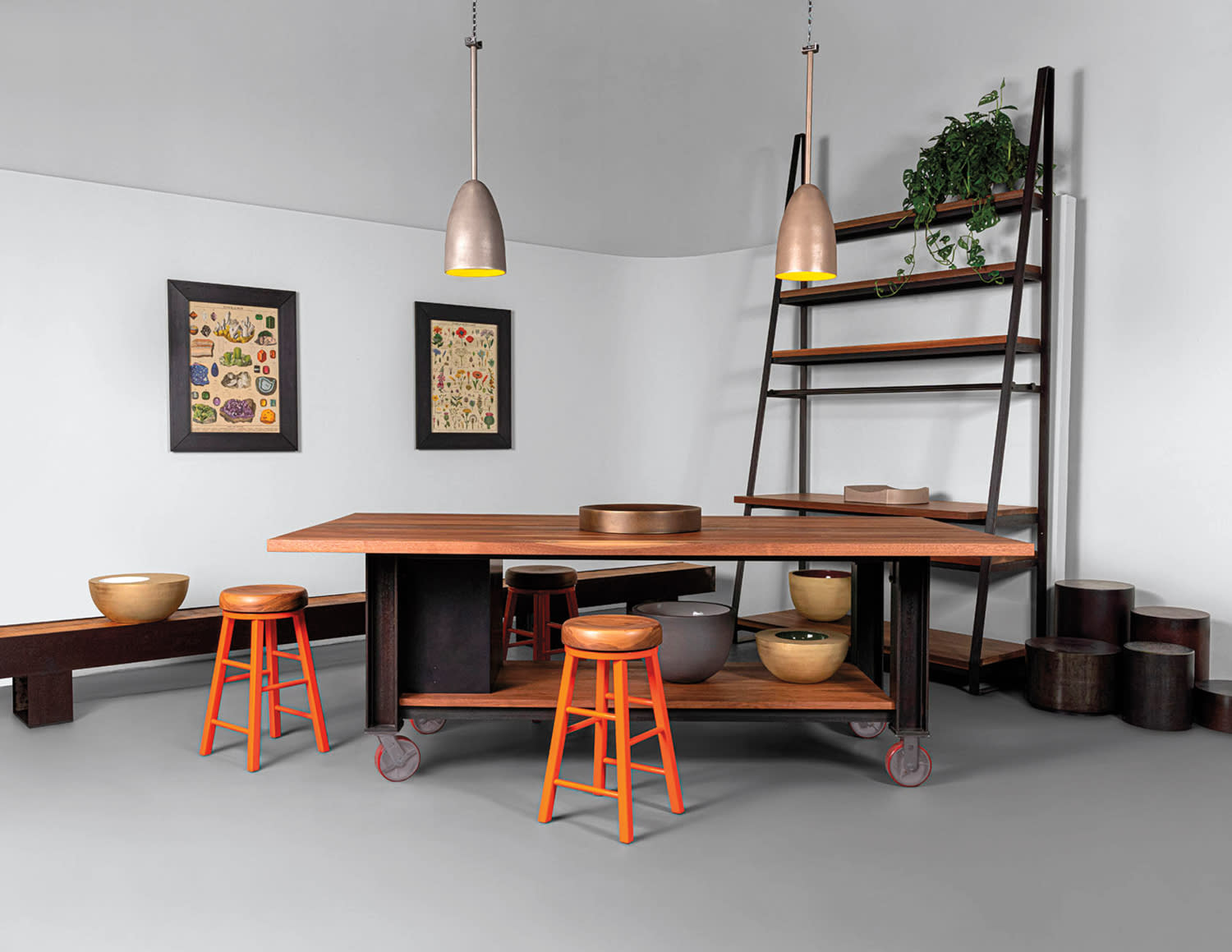 woodworking workshop with a table and orange stools