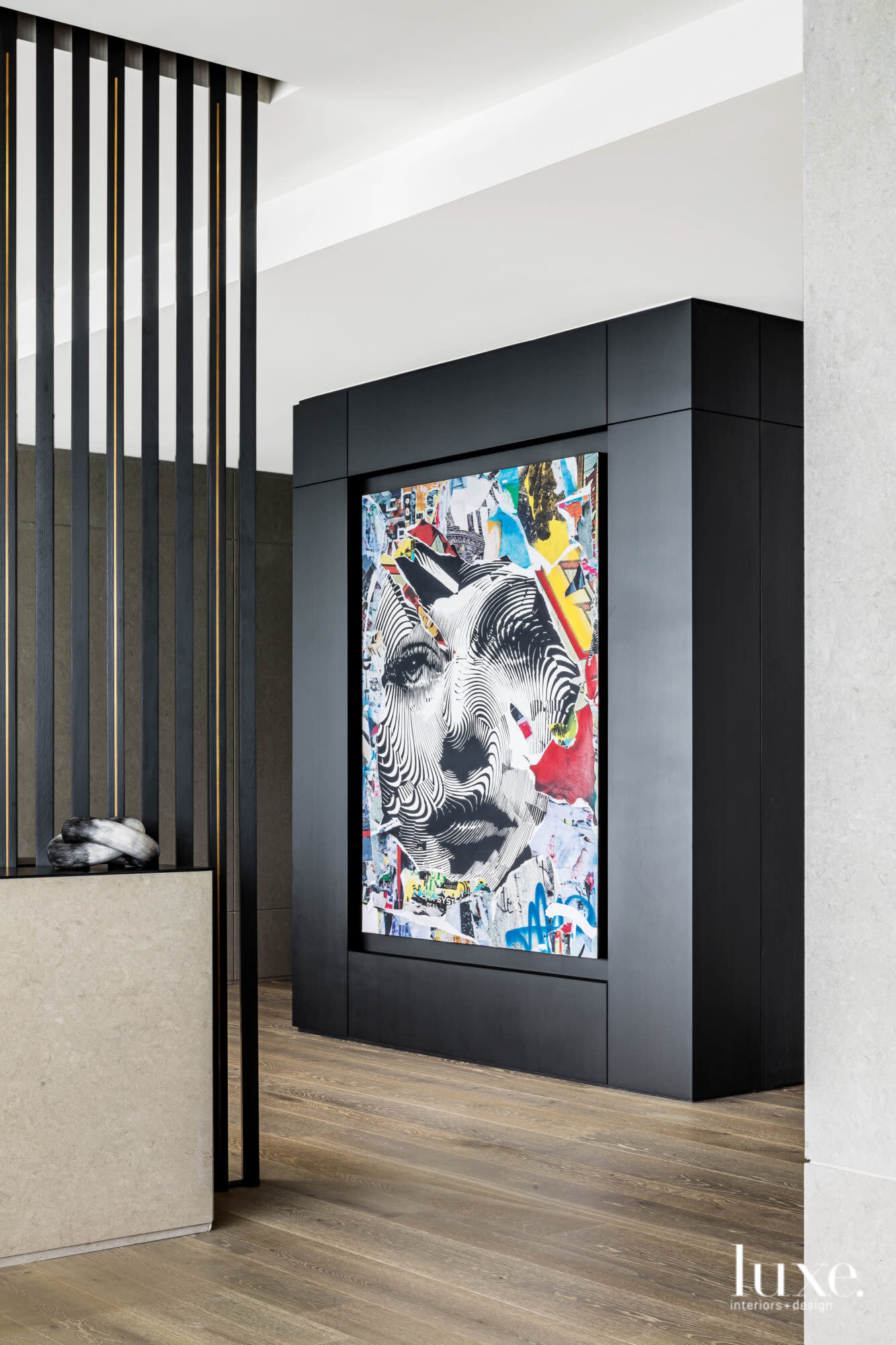 Large, colorful artwork set against a black backdrop.