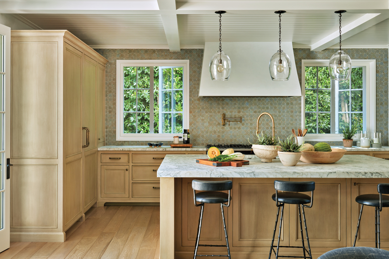 oak kitchen with plaster range hood