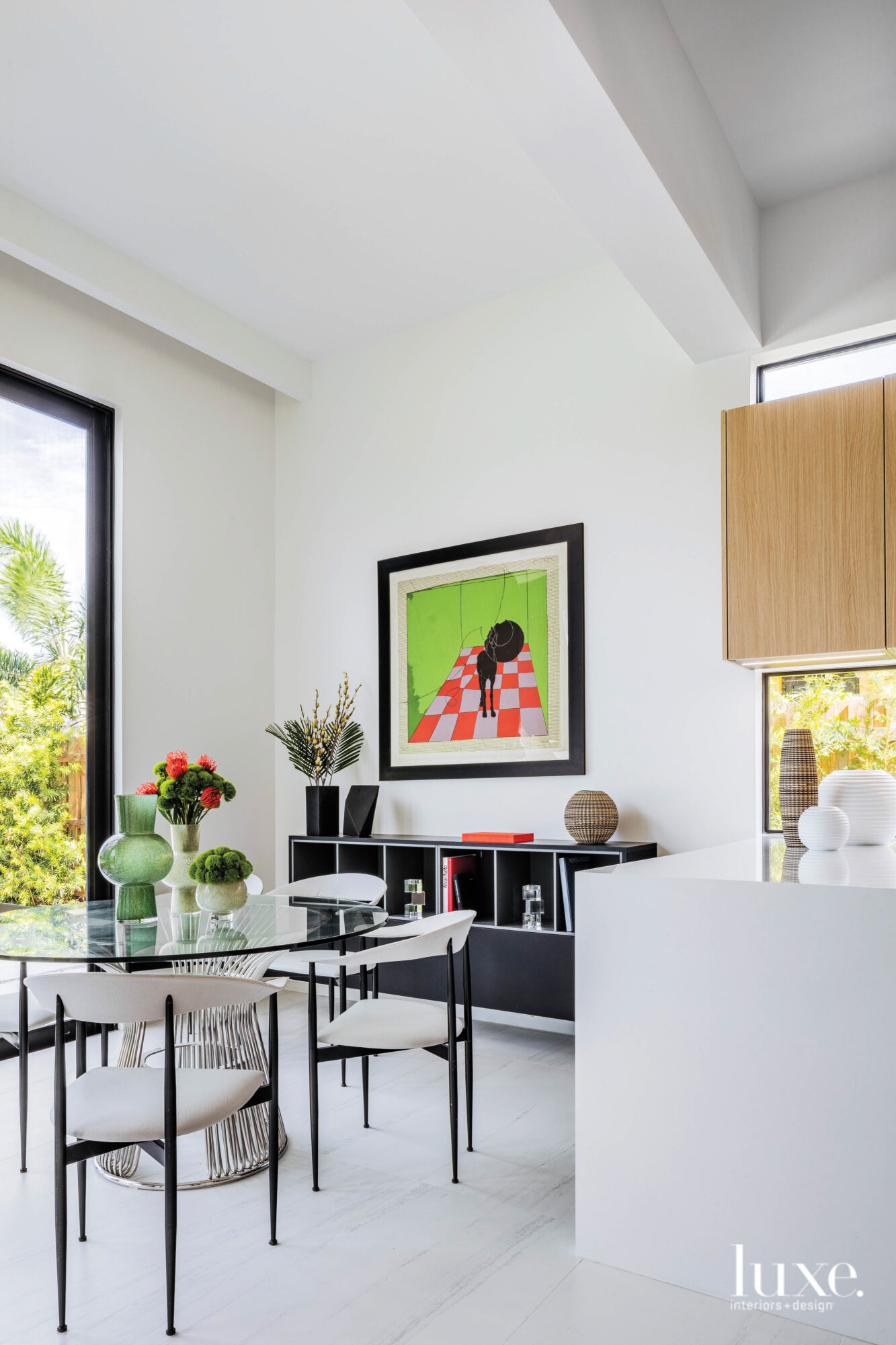 Breakfast nook with slim, vintage chairs.