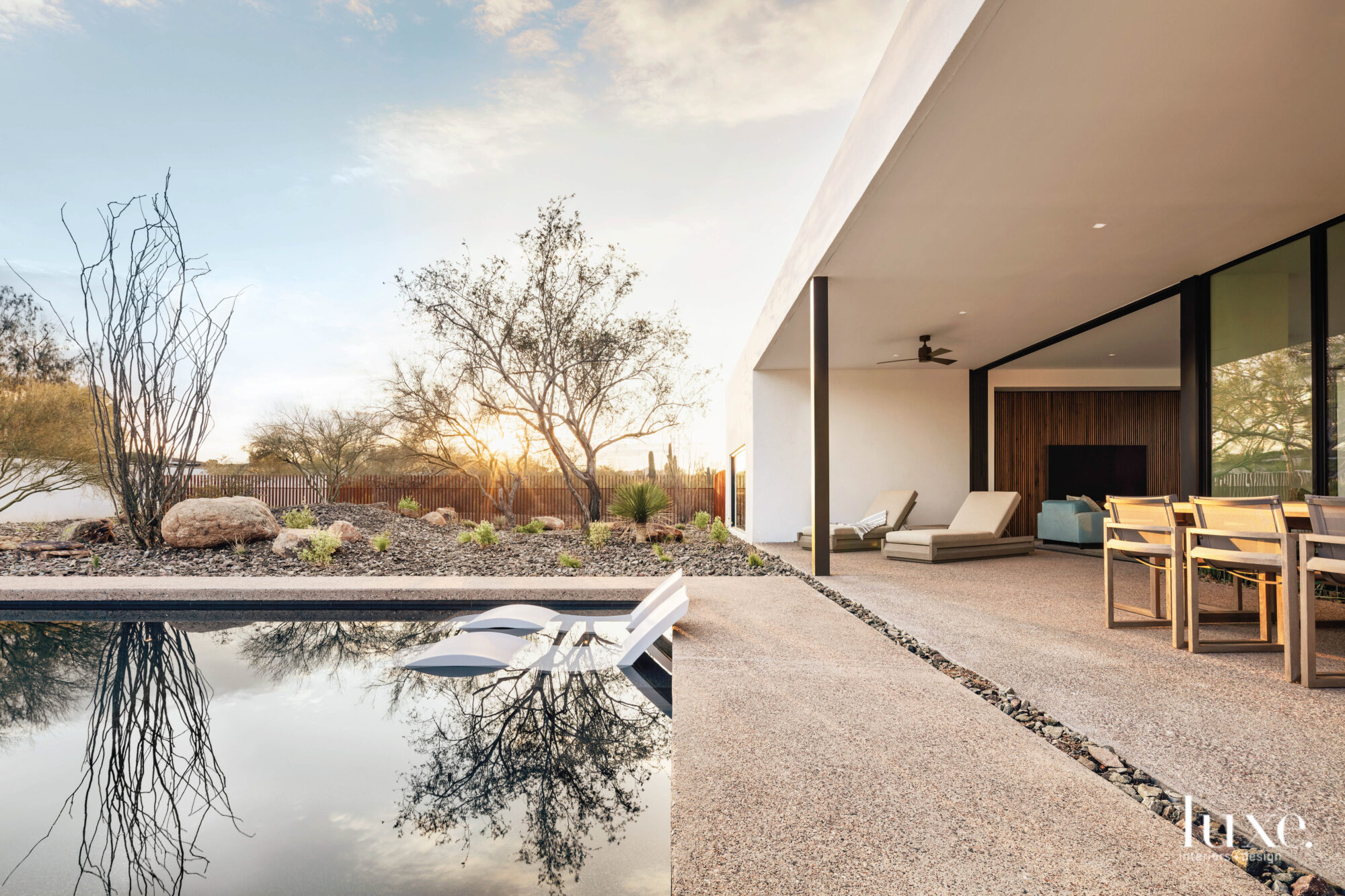 The pool is surrounded by the rugged desert terrain.