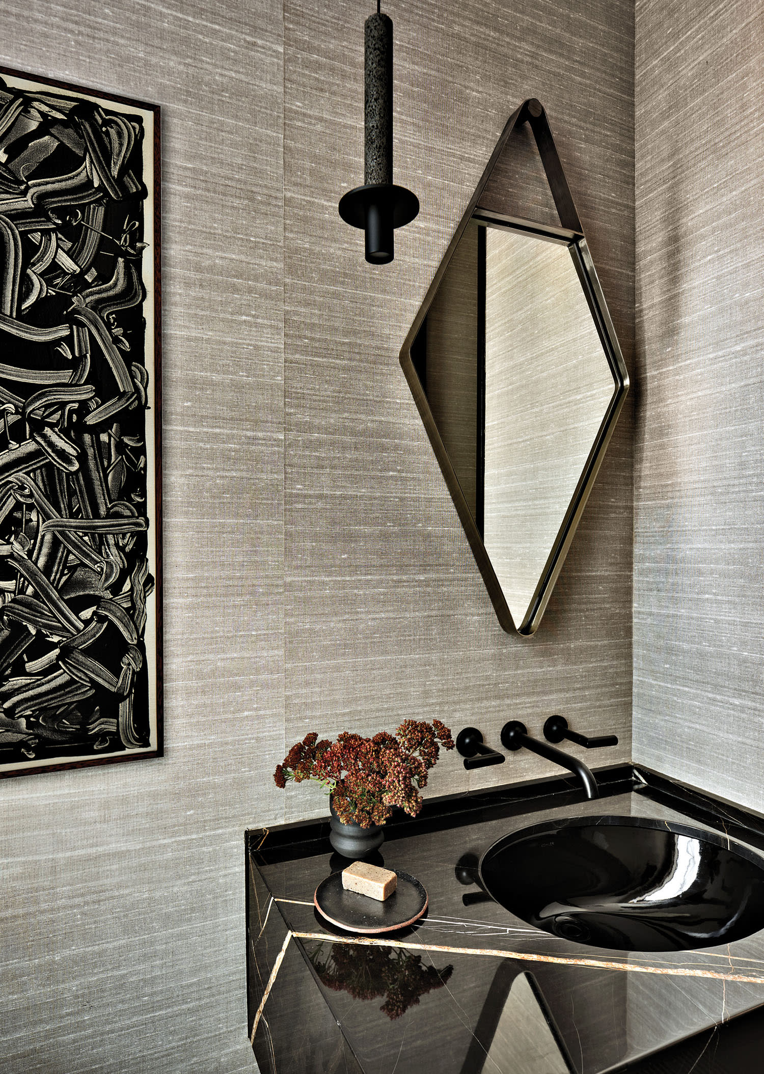 modern powder room with a diamond-shaped mirror