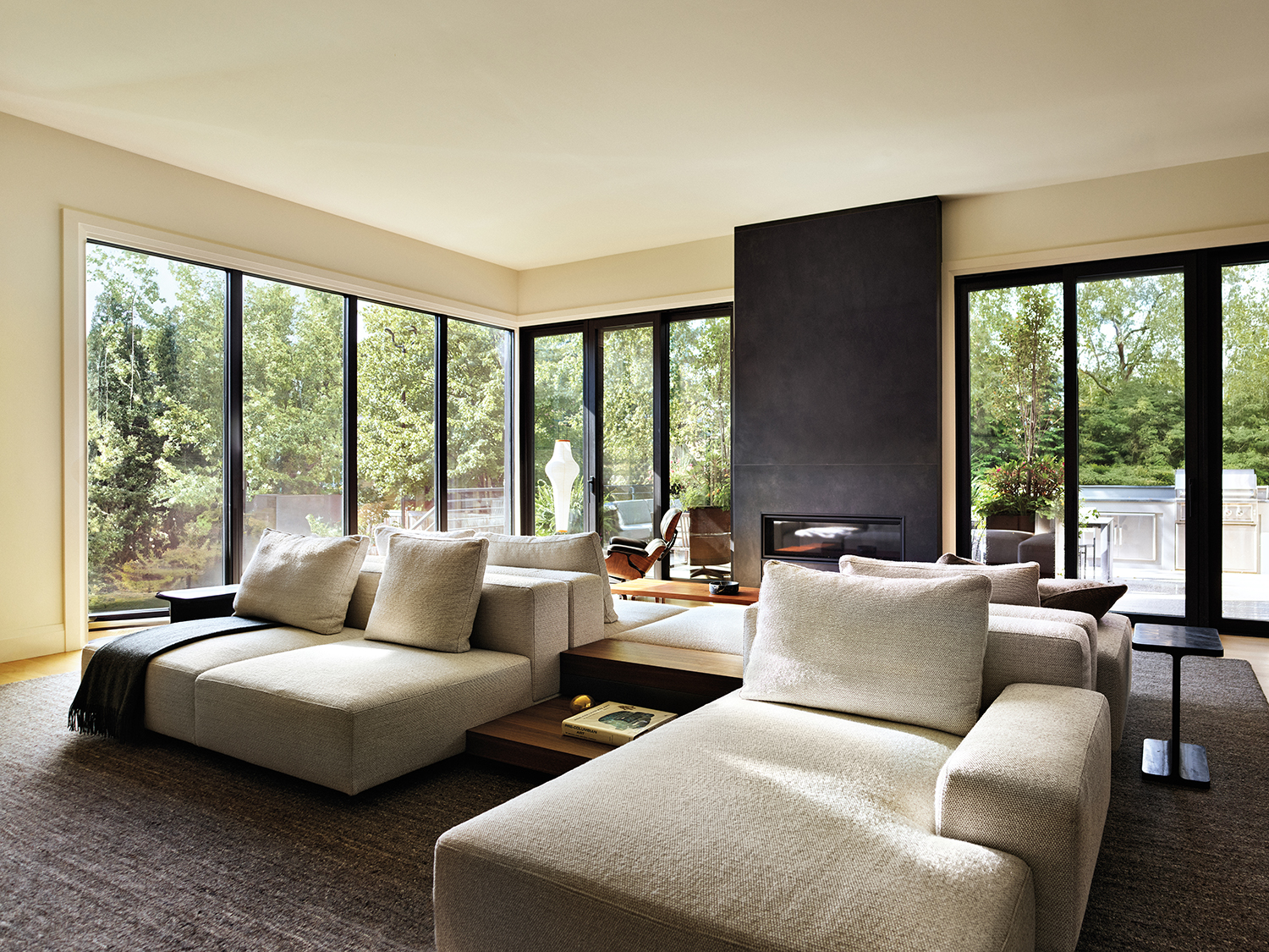 Contemporary Neutral Living Room with Limestone Wall | LUXE