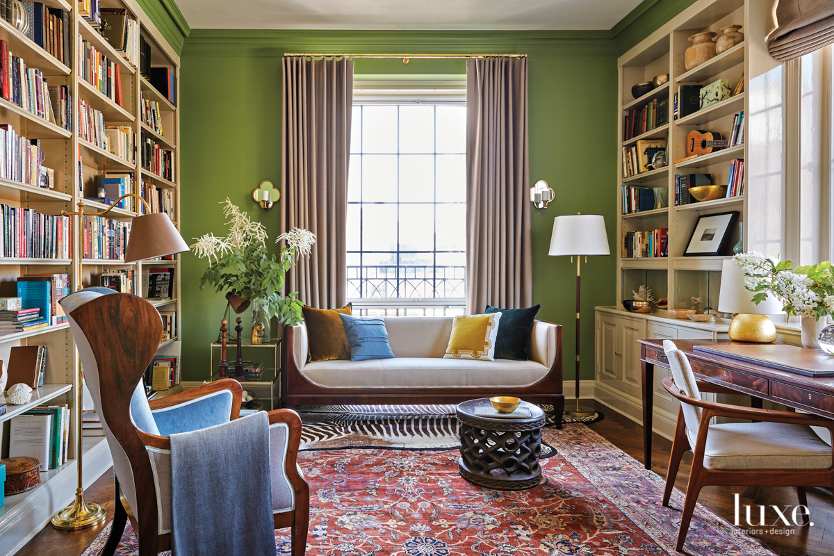 green library with midcentury modern furniture